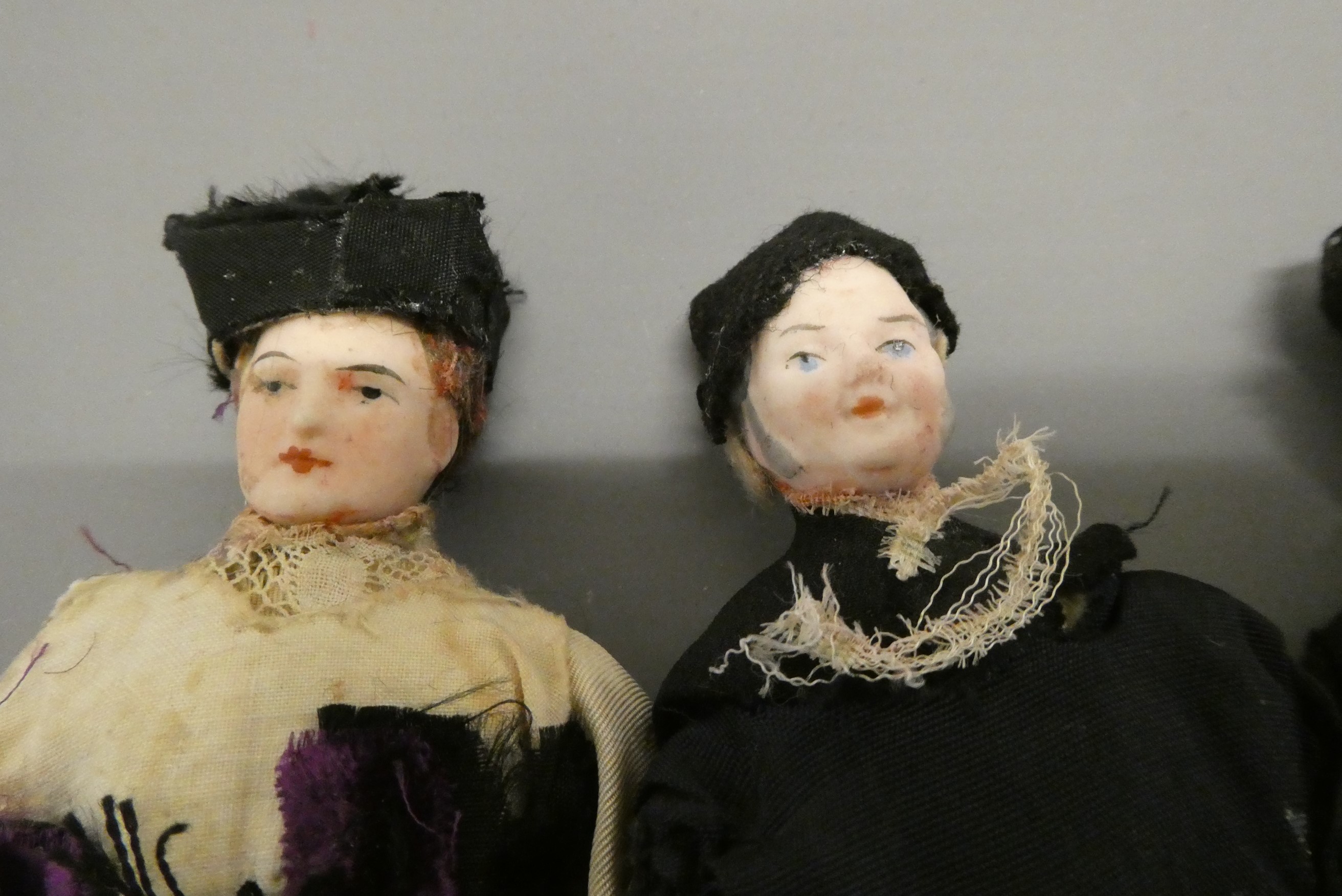 Four bisque shoulder head doll's house dolls, comprising four male priests, all with bisque lower Image