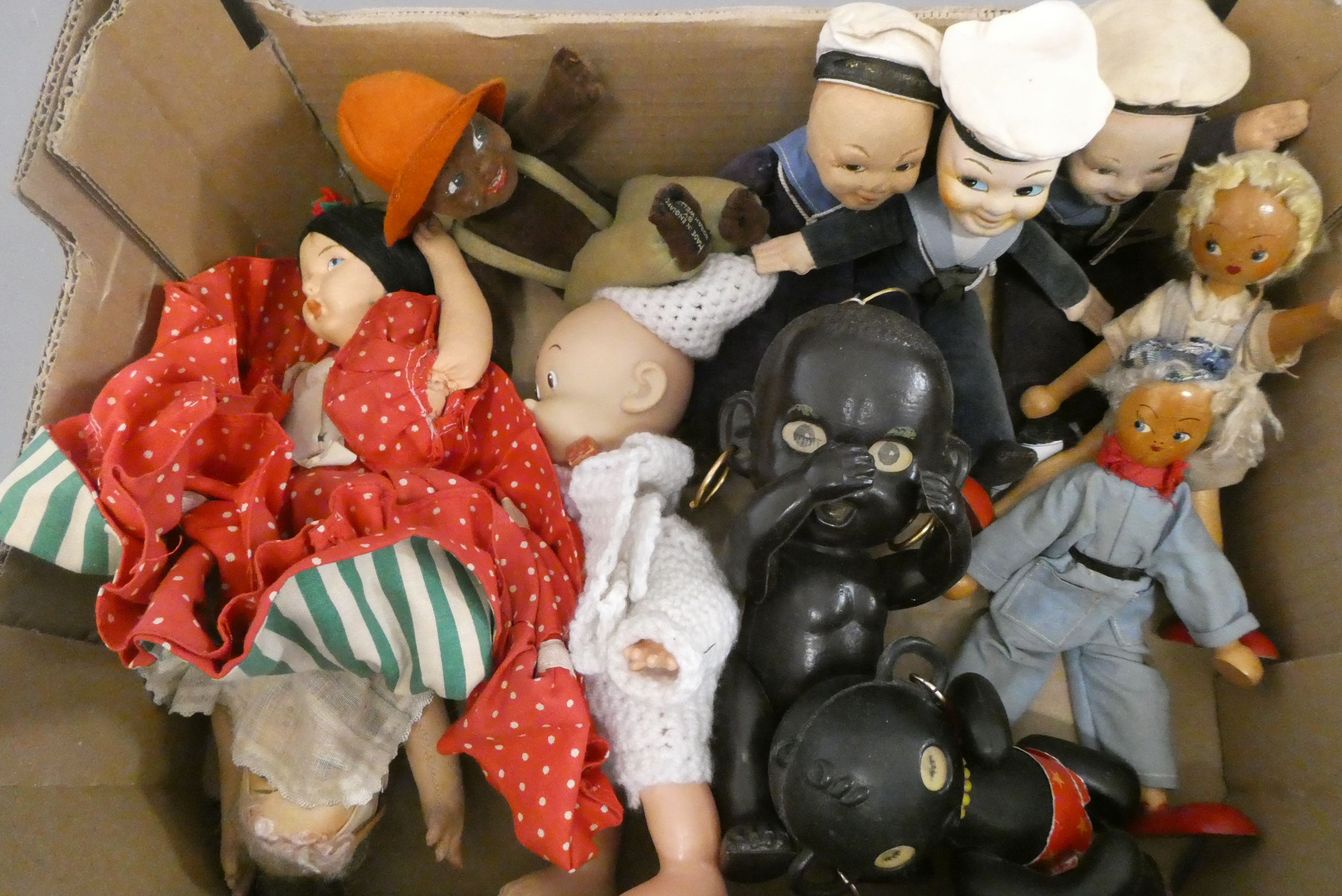 A box of mainly vintage dolls, including four Norah Wellings dolls and a reversible fabric doll Image