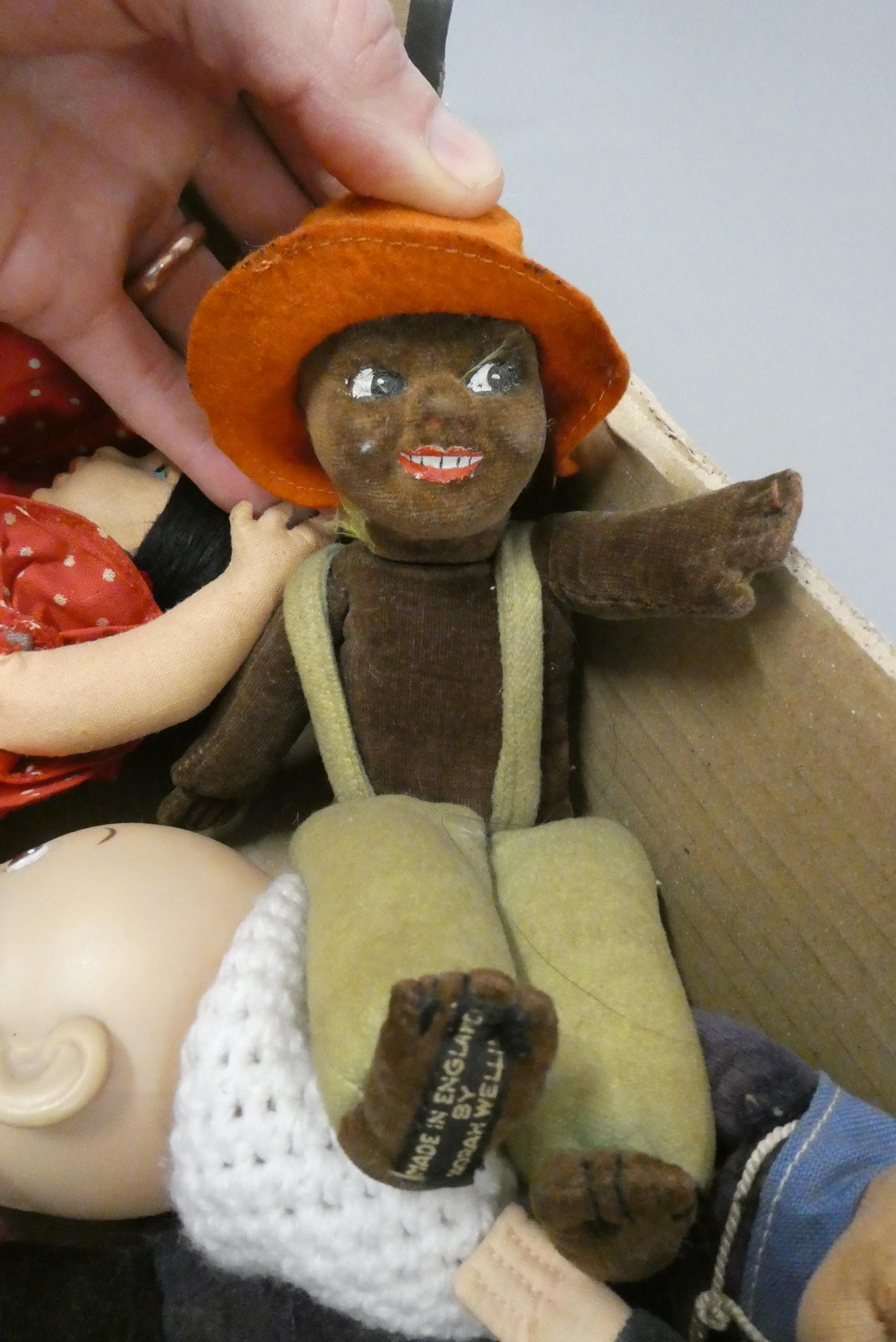 A box of mainly vintage dolls, including four Norah Wellings dolls and a reversible fabric doll Image