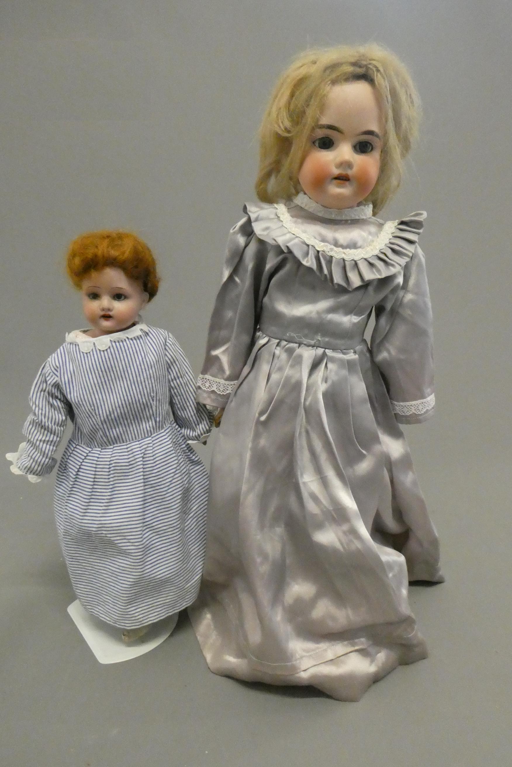 Two Armand Marseille bisque shoulder head dolls Image