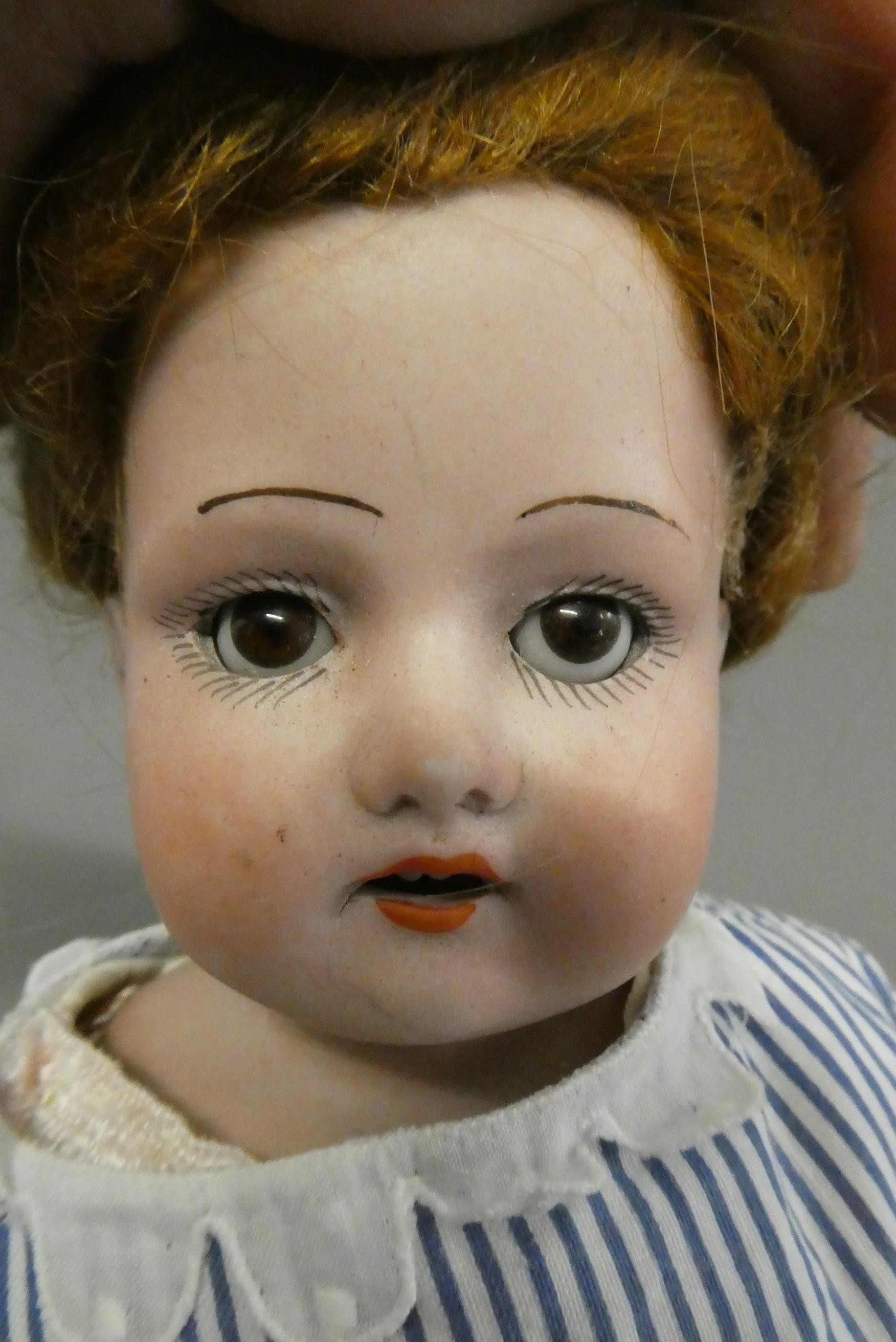 Two Armand Marseille bisque shoulder head dolls Image