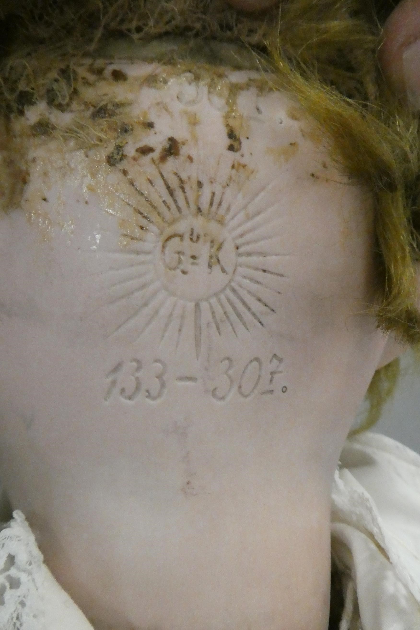 A Gebruder Kuhnlenz bisque socket head doll Image