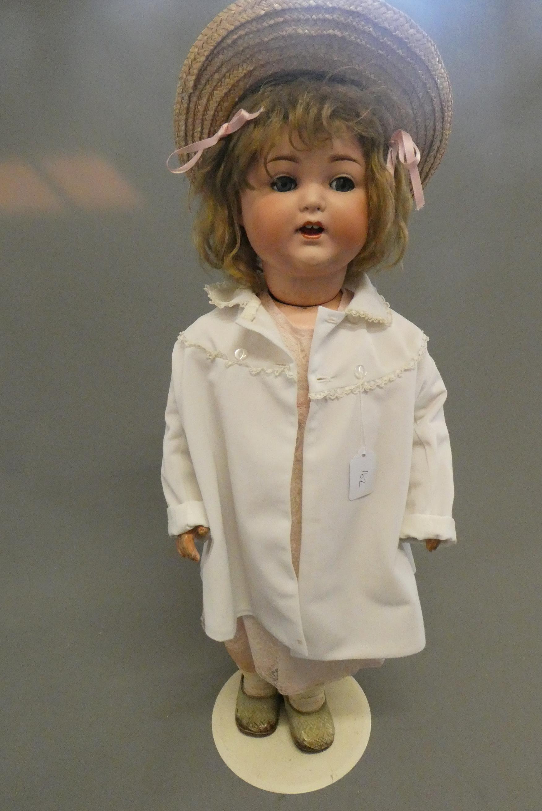 An Armand Marseille bisque socket head doll Image
