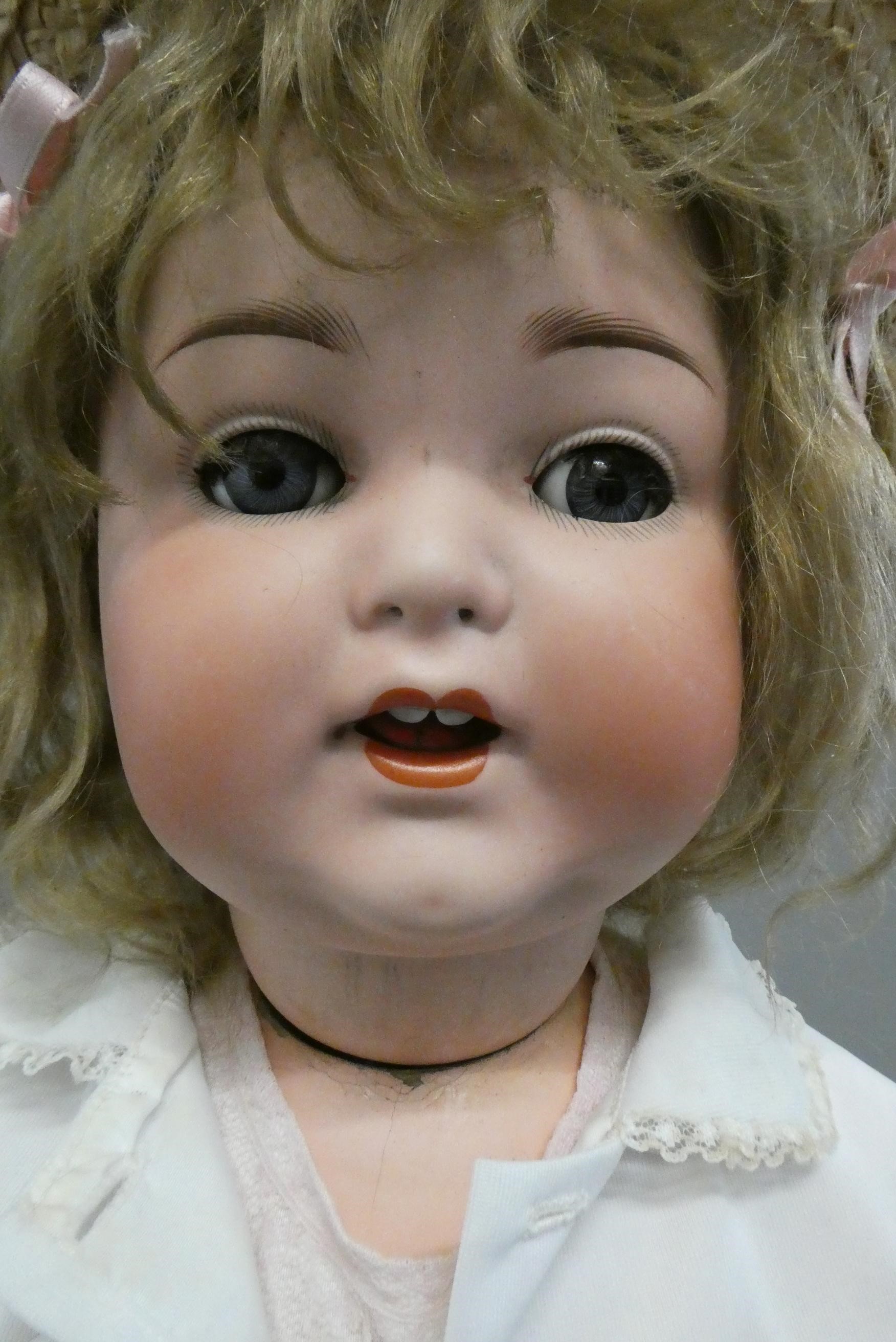 An Armand Marseille bisque socket head doll Image