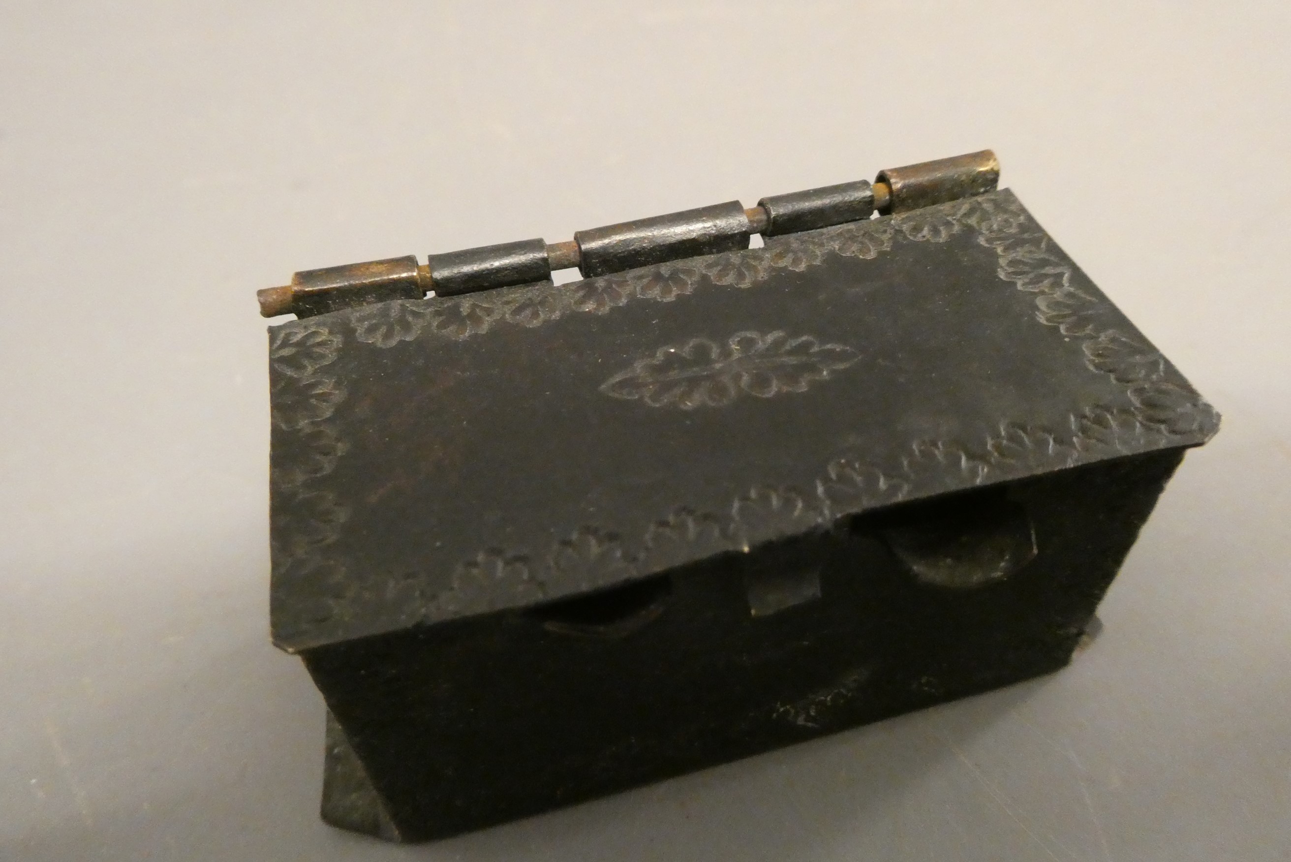 Three doll's house items, comprising a 3 3/4" British made brass lantern clock, a 2 3/8" tinplate Image