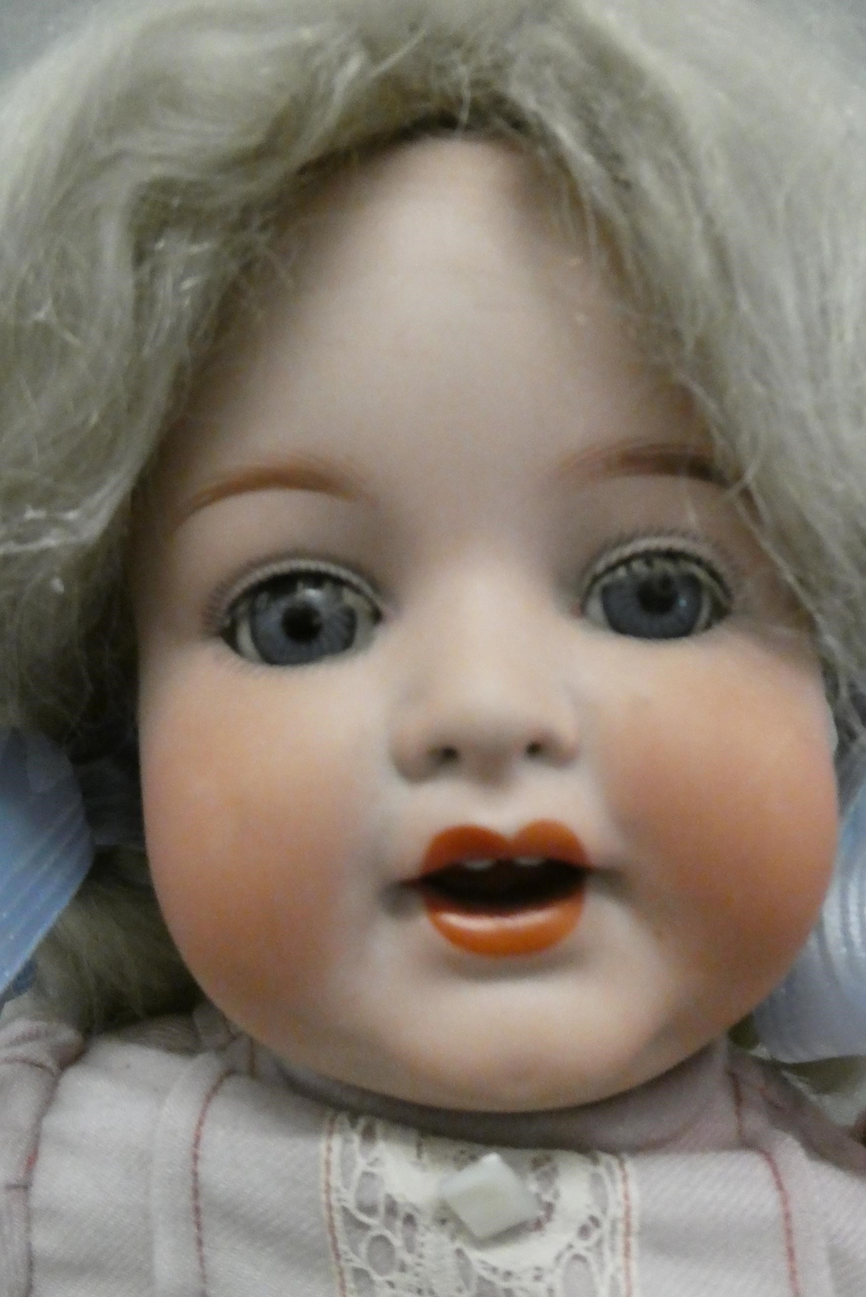 Three Armand Marseille bisque head dolls Image
