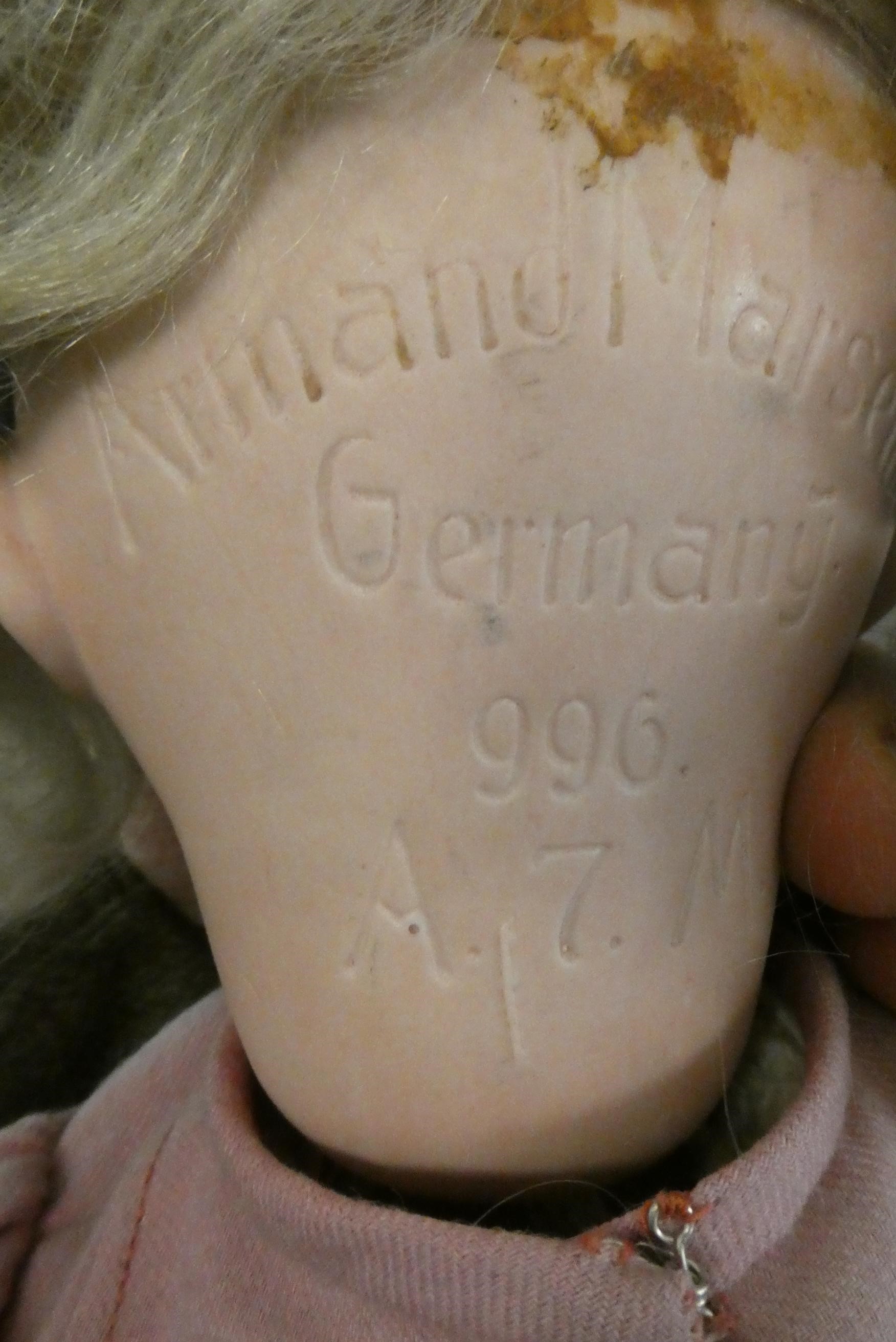 Three Armand Marseille bisque head dolls Image