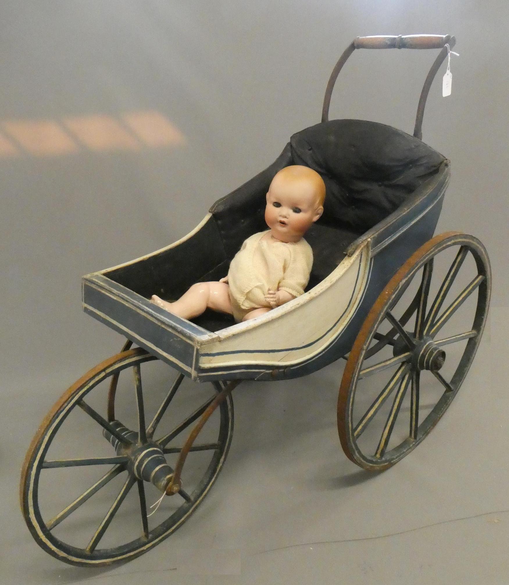 A Victorian three wheel doll's pram Image