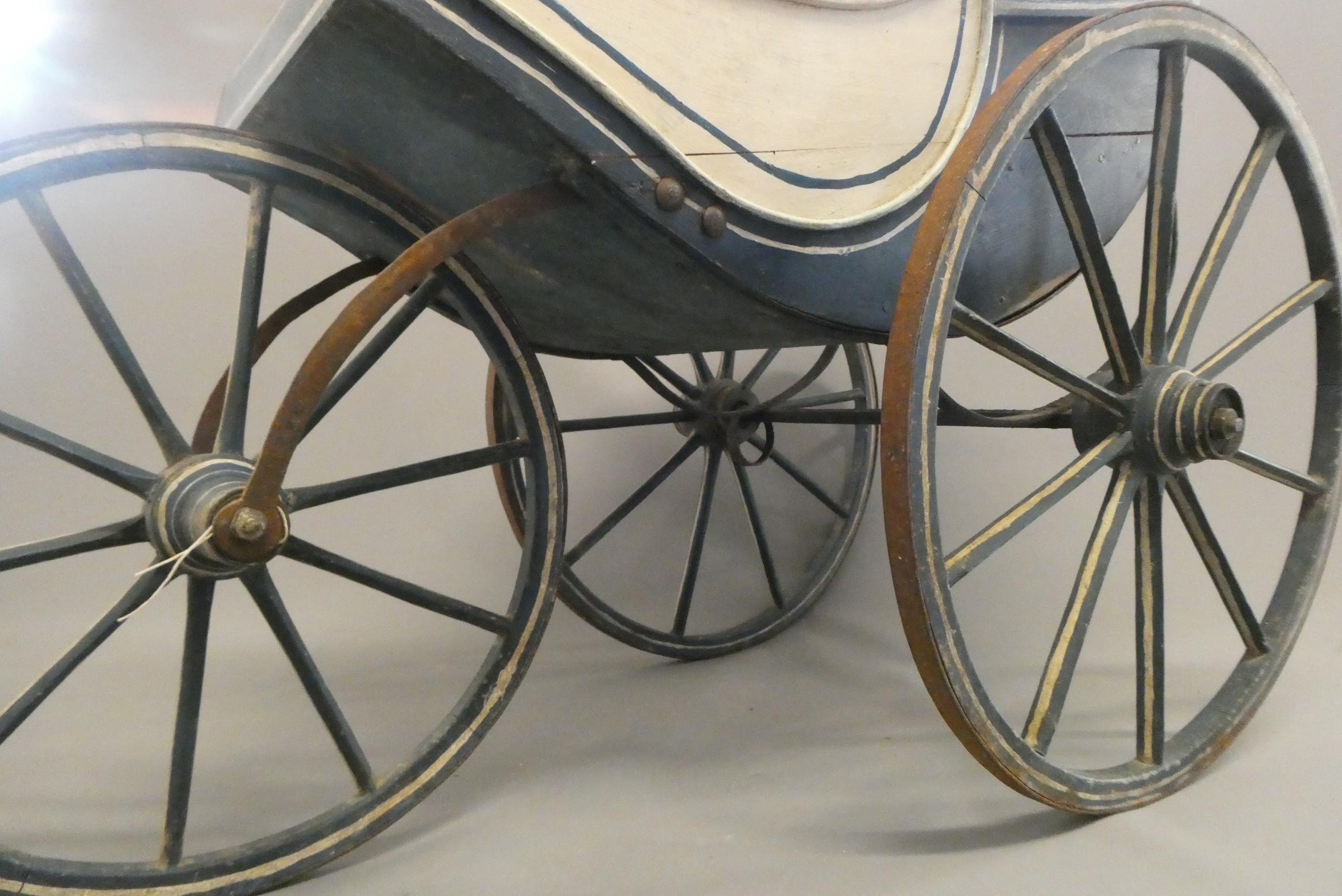 A Victorian three wheel doll's pram Image