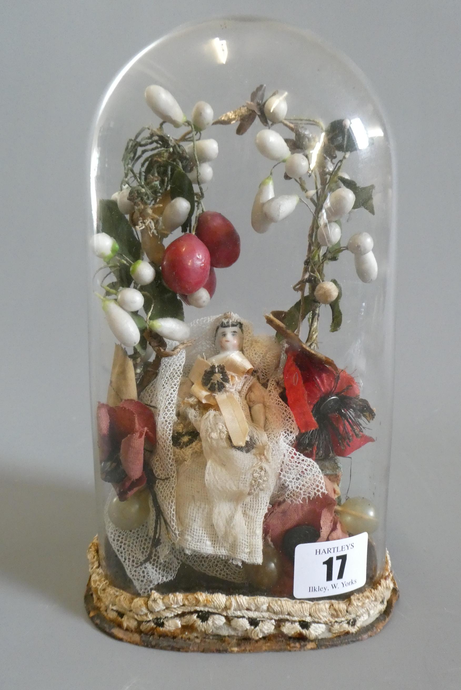 A ceramic shoulder head doll and wax fruit diorama Image