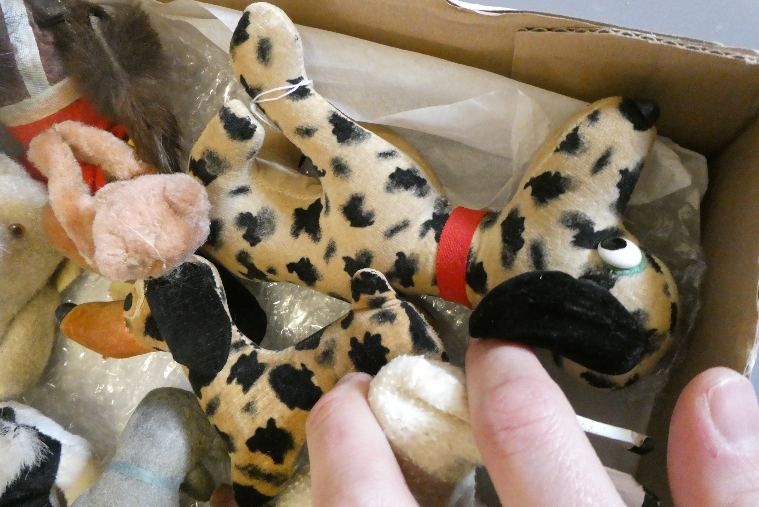 A collection of vintage plush toys including two clockwork toys, a German sheep and three lambs with Image