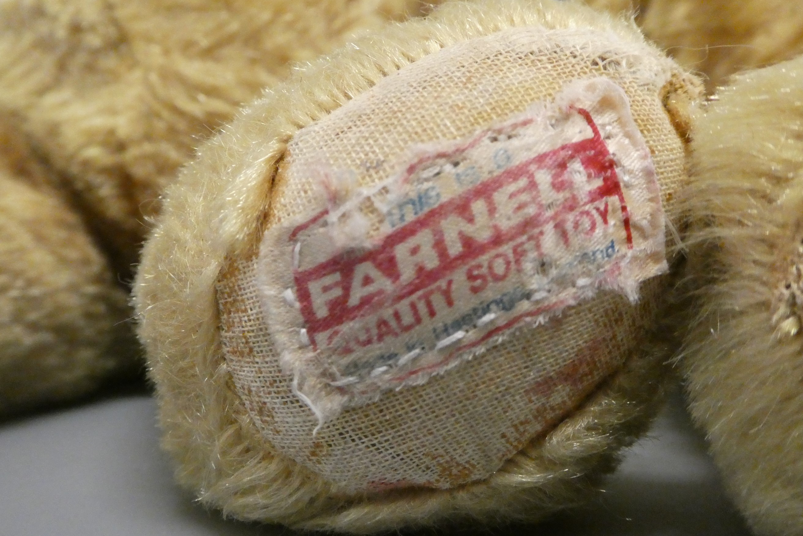 Twin Farnell teddy bears, with sewn noses, amber glass eyes, fabric pads and one with maker's label Image