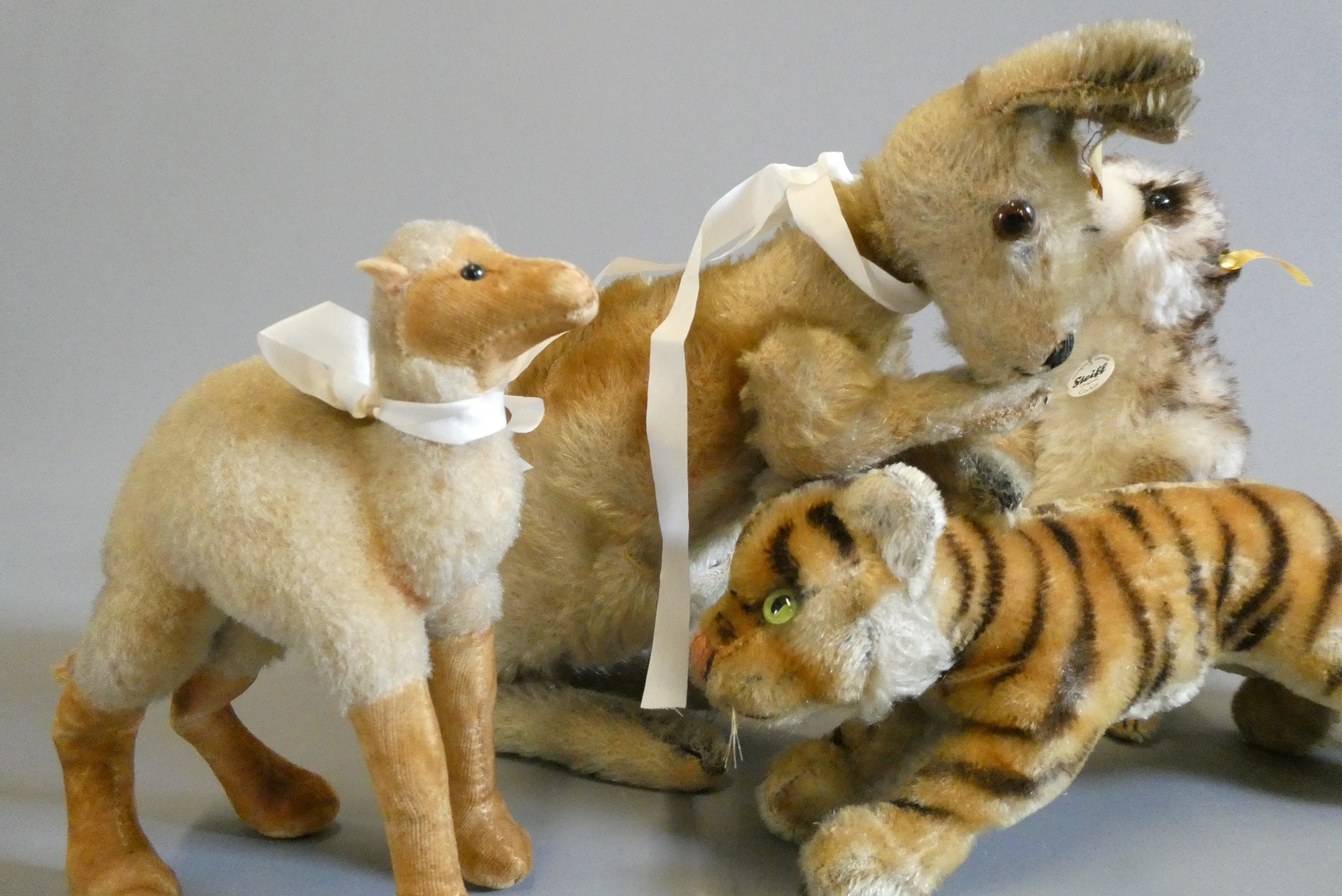 Five mostly Steiff animals, mostly vintage, including a tiger, a meercat, a camel and two kangeroos Image