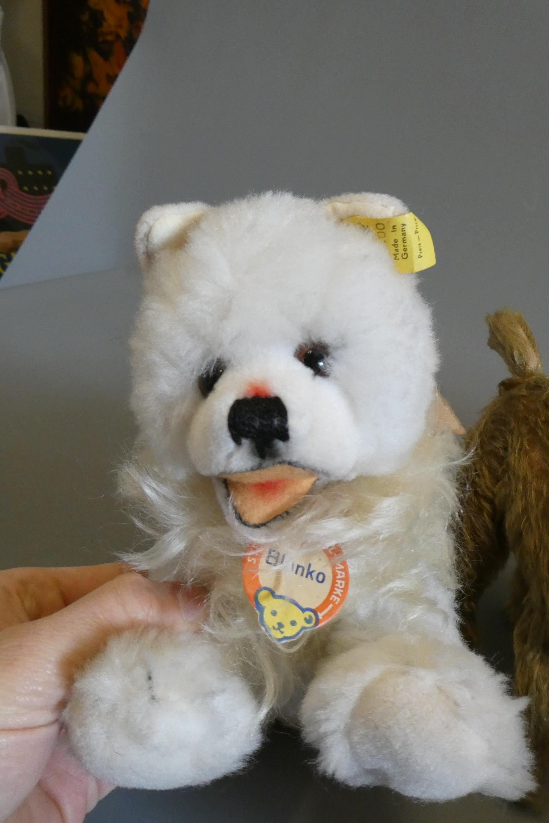 Seven vintage plush toys, including a Steiff Blanko and a Merrythought pig (Est. plus 24% buyer's Image