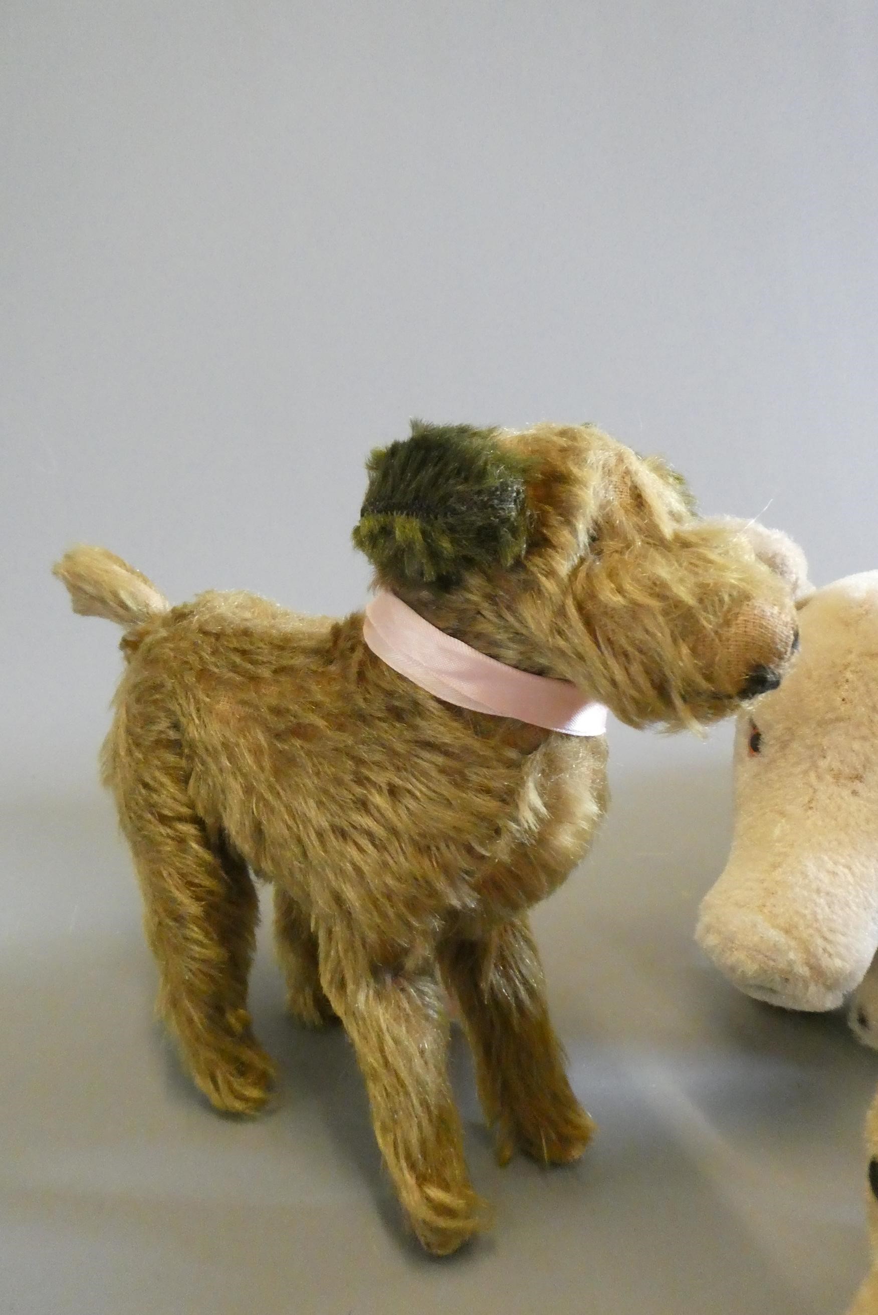 Seven vintage plush toys, including a Steiff Blanko and a Merrythought pig (Est. plus 24% buyer's Image