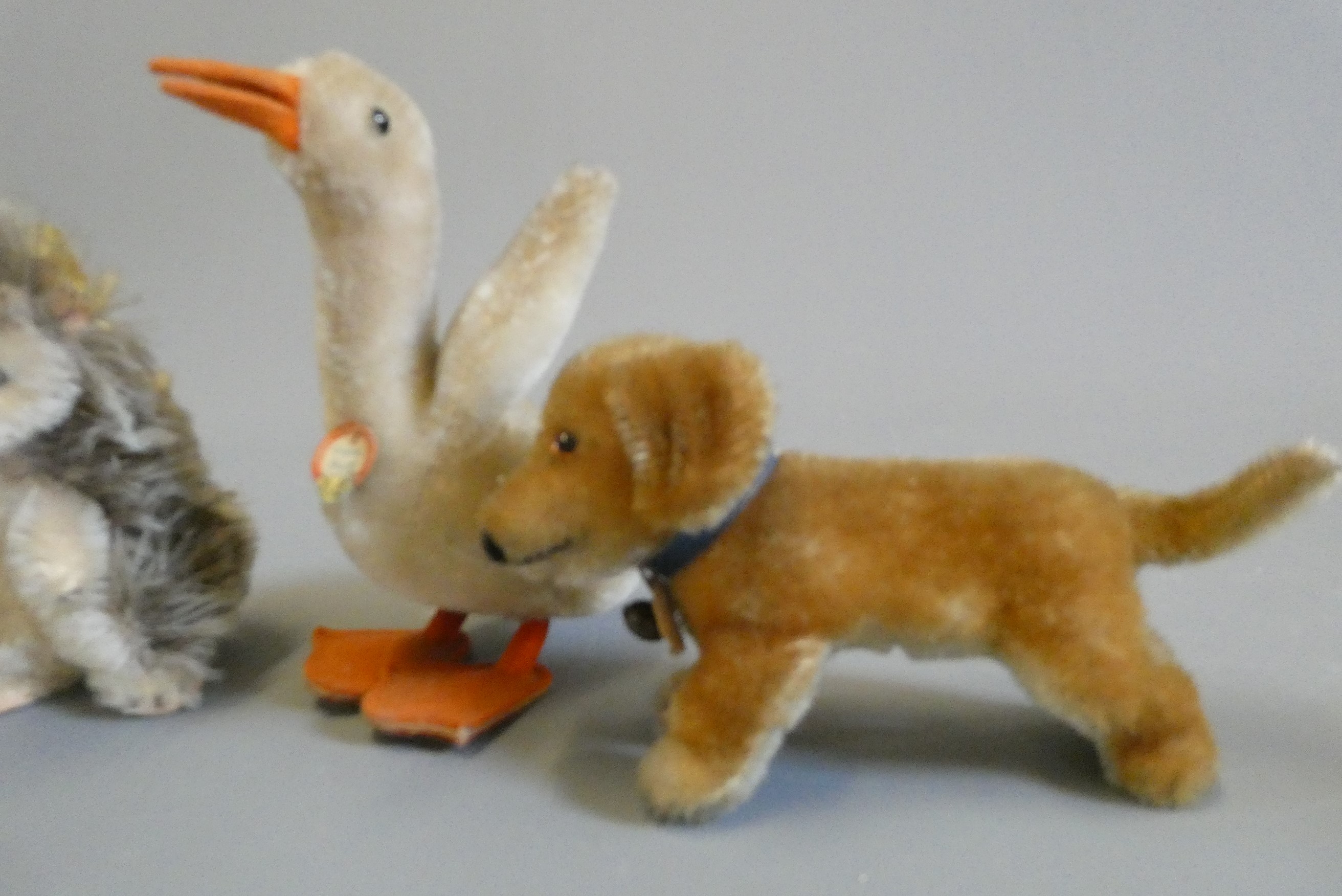 Four Steiff animals, comprising a goose, a hedgehog, a dog and Bazi (Est. plus 24% buyer's premium Image