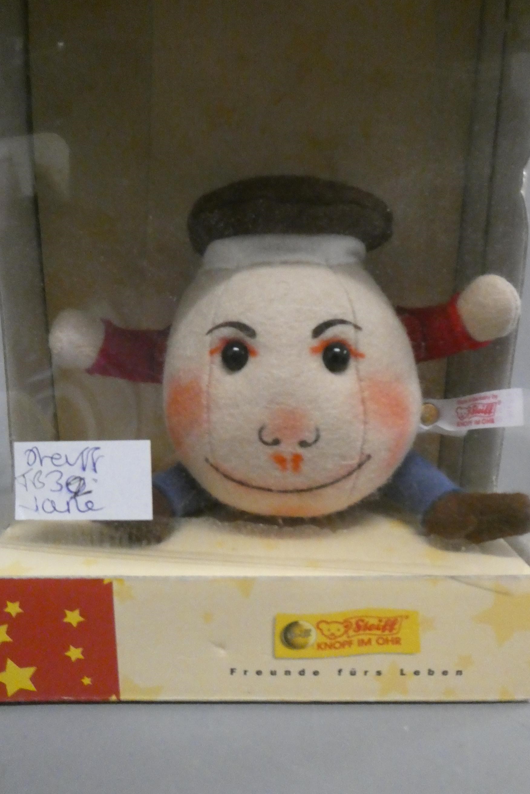 Two soft toys, comprising a boxed 9cm Steiff Humpty Dumpty "The Legend of Lewis Caroll" and a felt Image