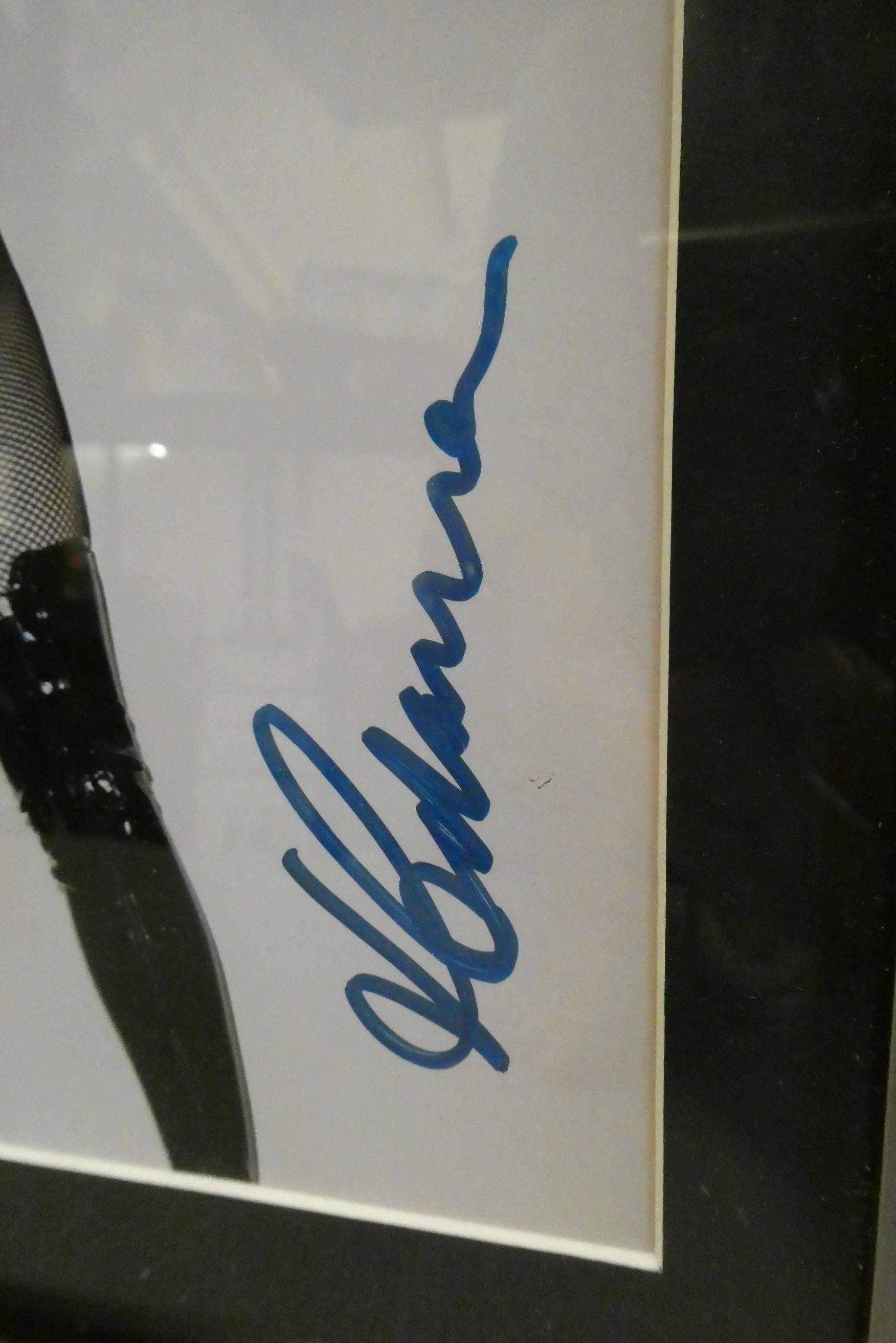 Signed photograph of Madonna, framed, with Todd Mueller certificate (Est. plus 24% buyer's premium Image