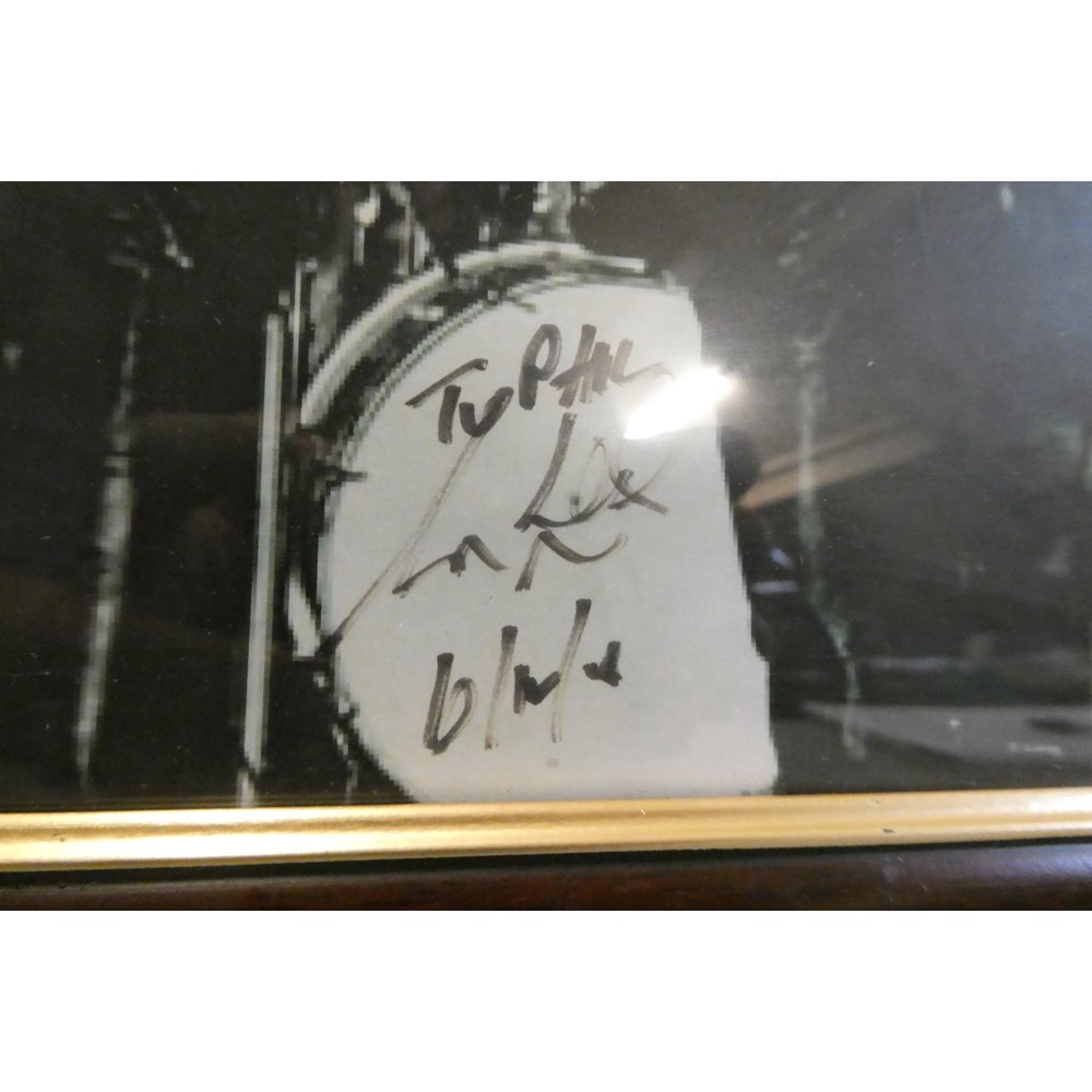 Sam Leach Two photographs signed by sam leach, photographed with members of the ...