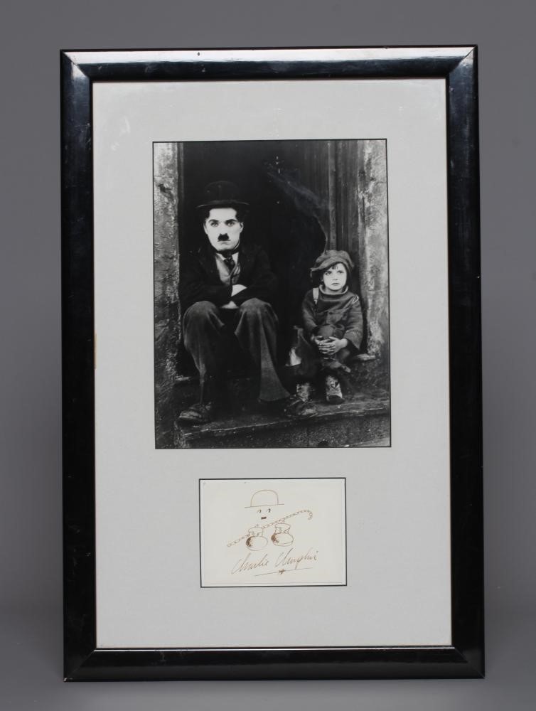 Charlie Chaplin autograph, together with small ink illustration and framed with a photograph, 12 Image