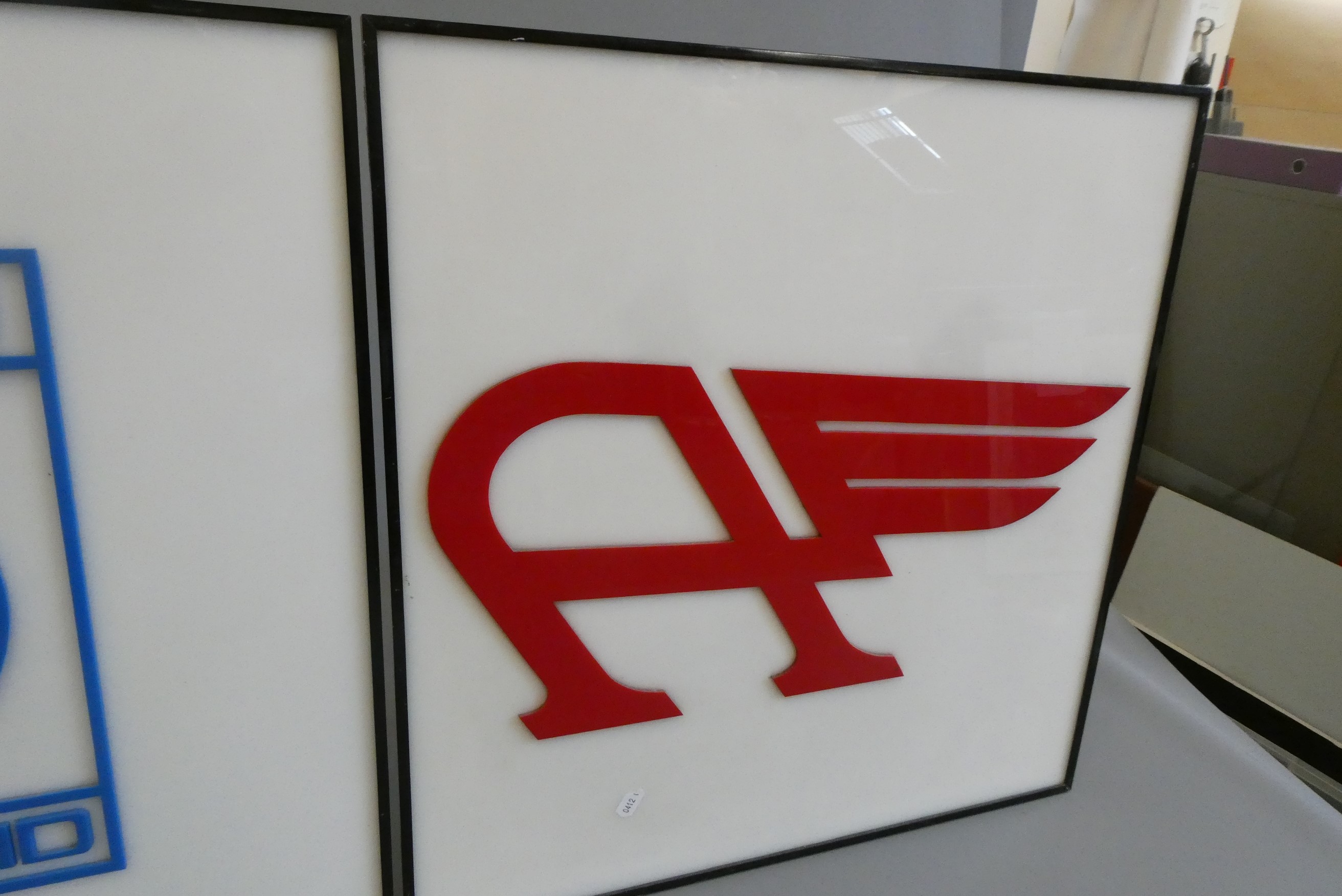 Three reproduction automobile advertising signs Image