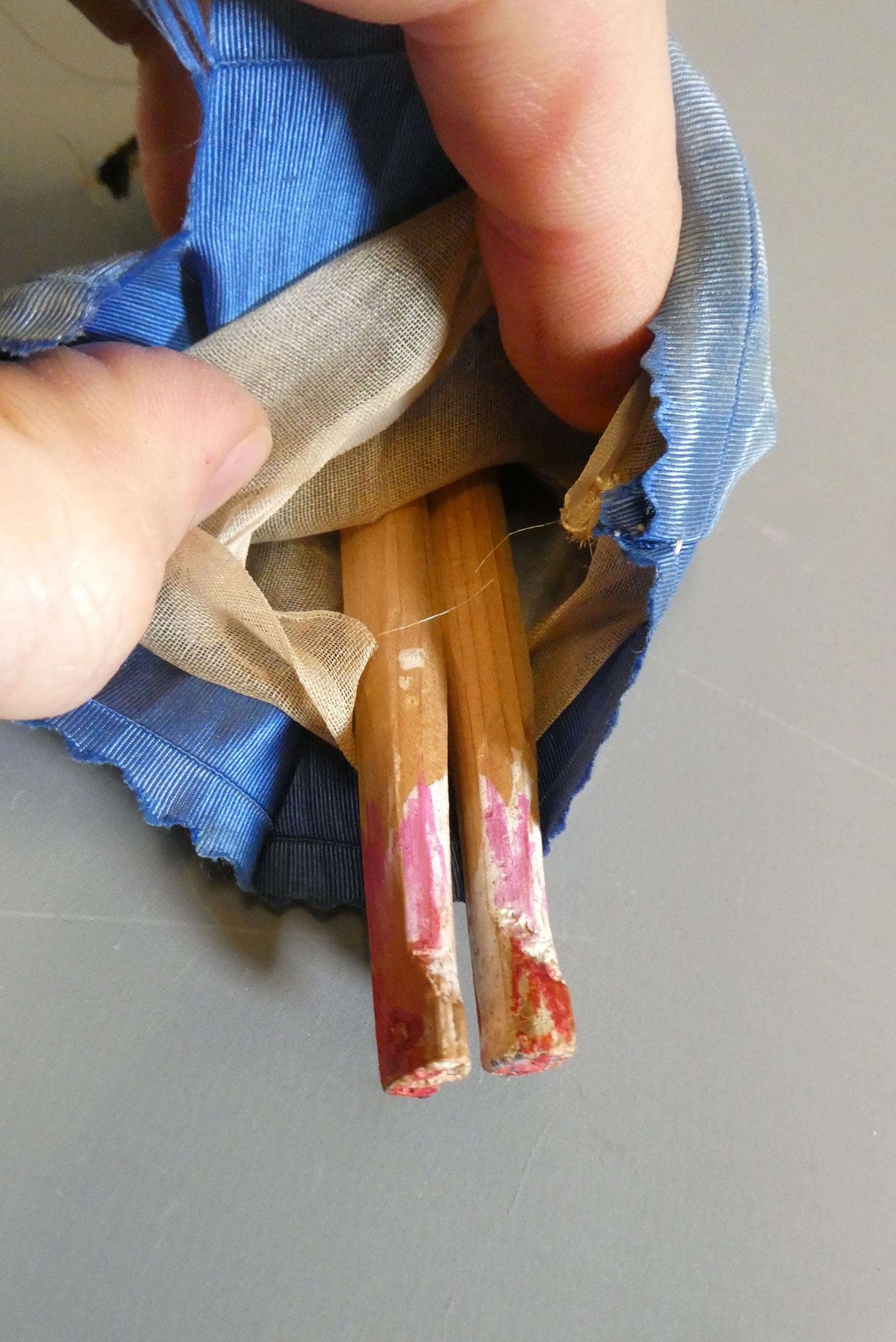 A Victorian peg doll of carved would construction, with painted features, jointed shoulders and Image