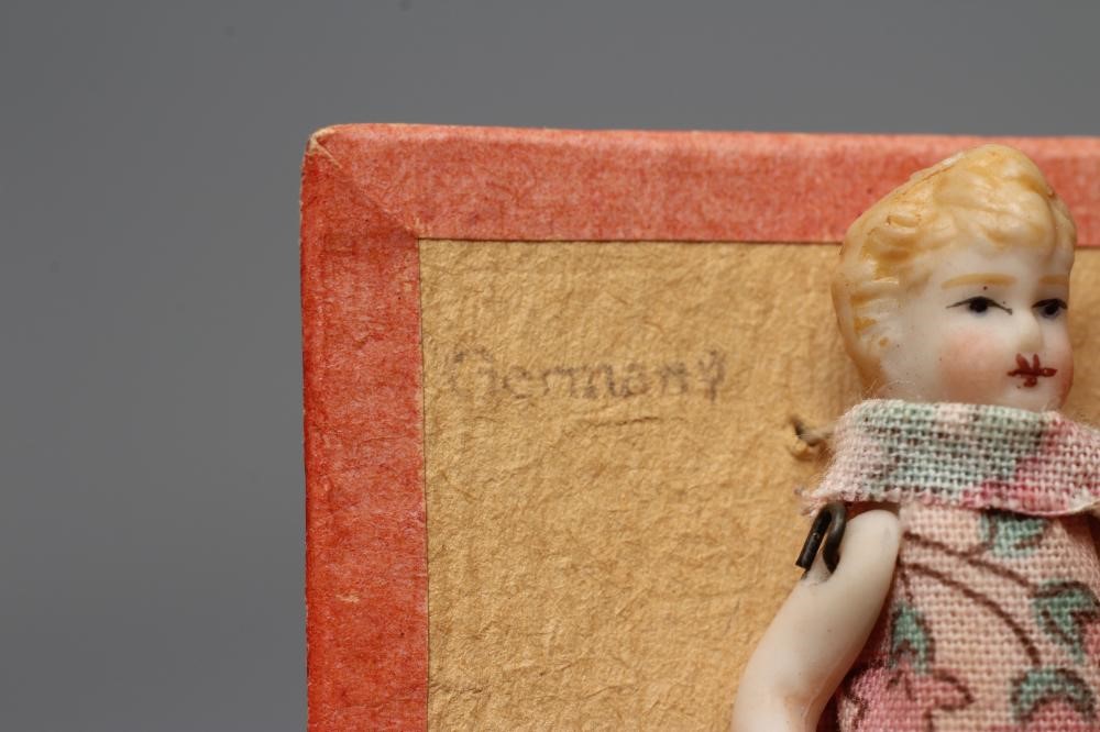 Six Hertwig & Co. all bisque doll's house dolls with moulded and painted features Image
