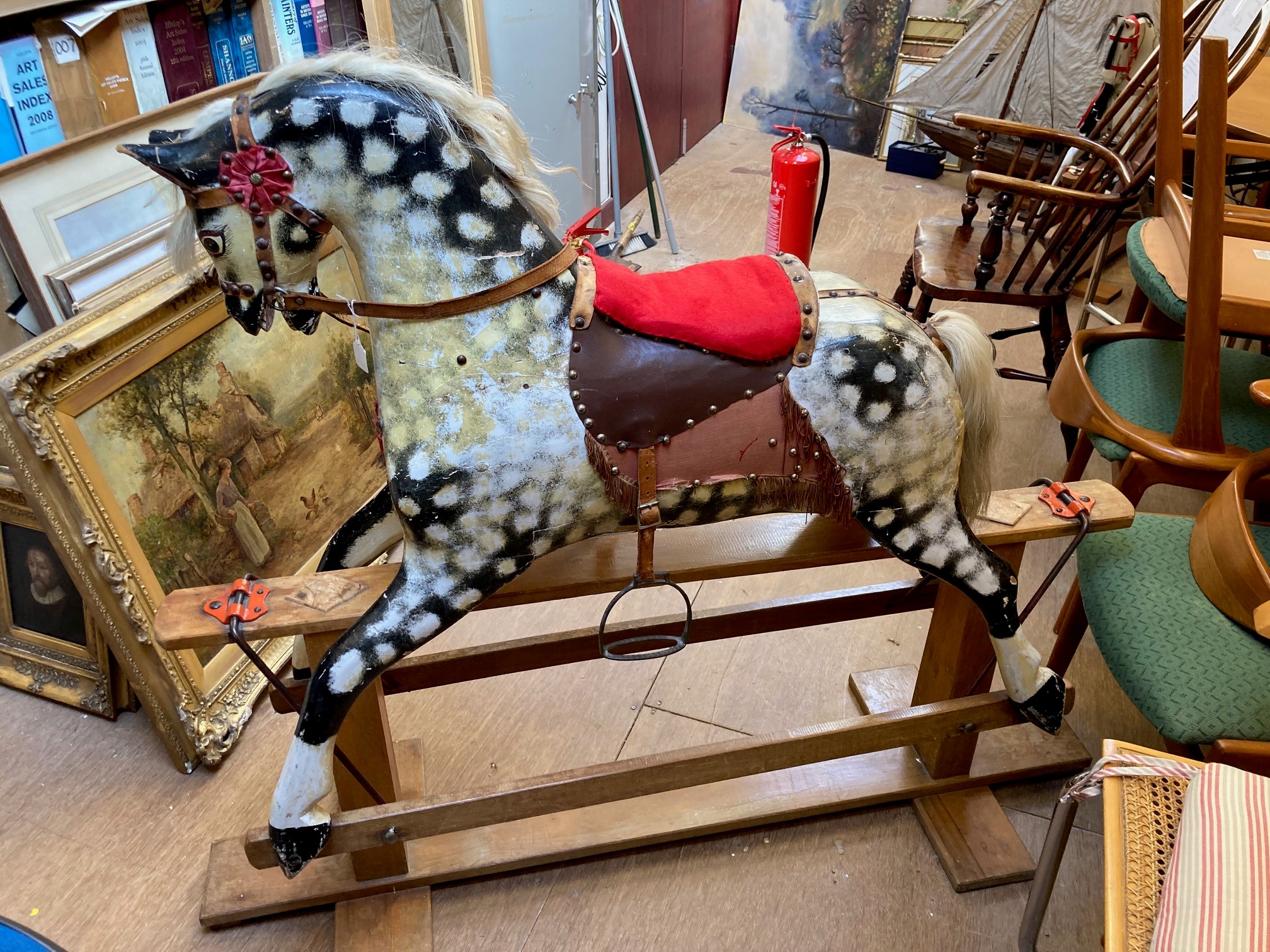 A wood carved rocking horse Image