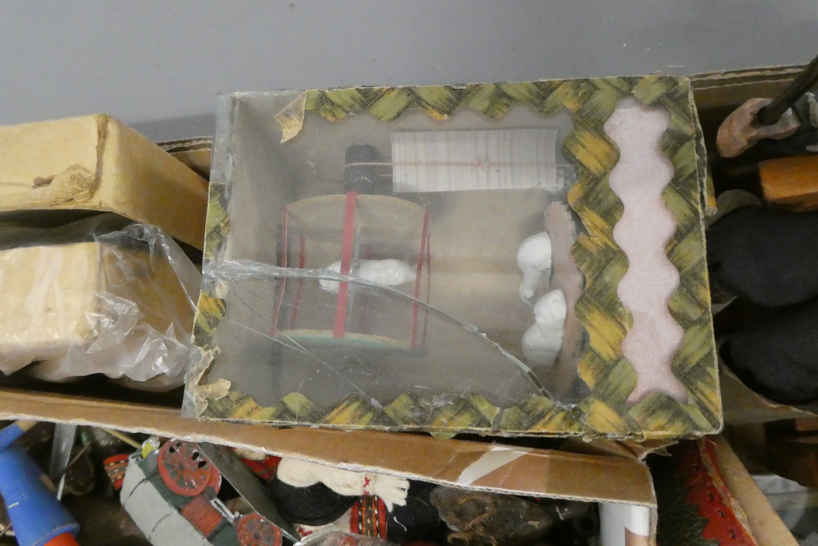 A boxed filled with vintage and antique toys, including Bonzo salt and pepper, Dismal Desmond pot, a Image