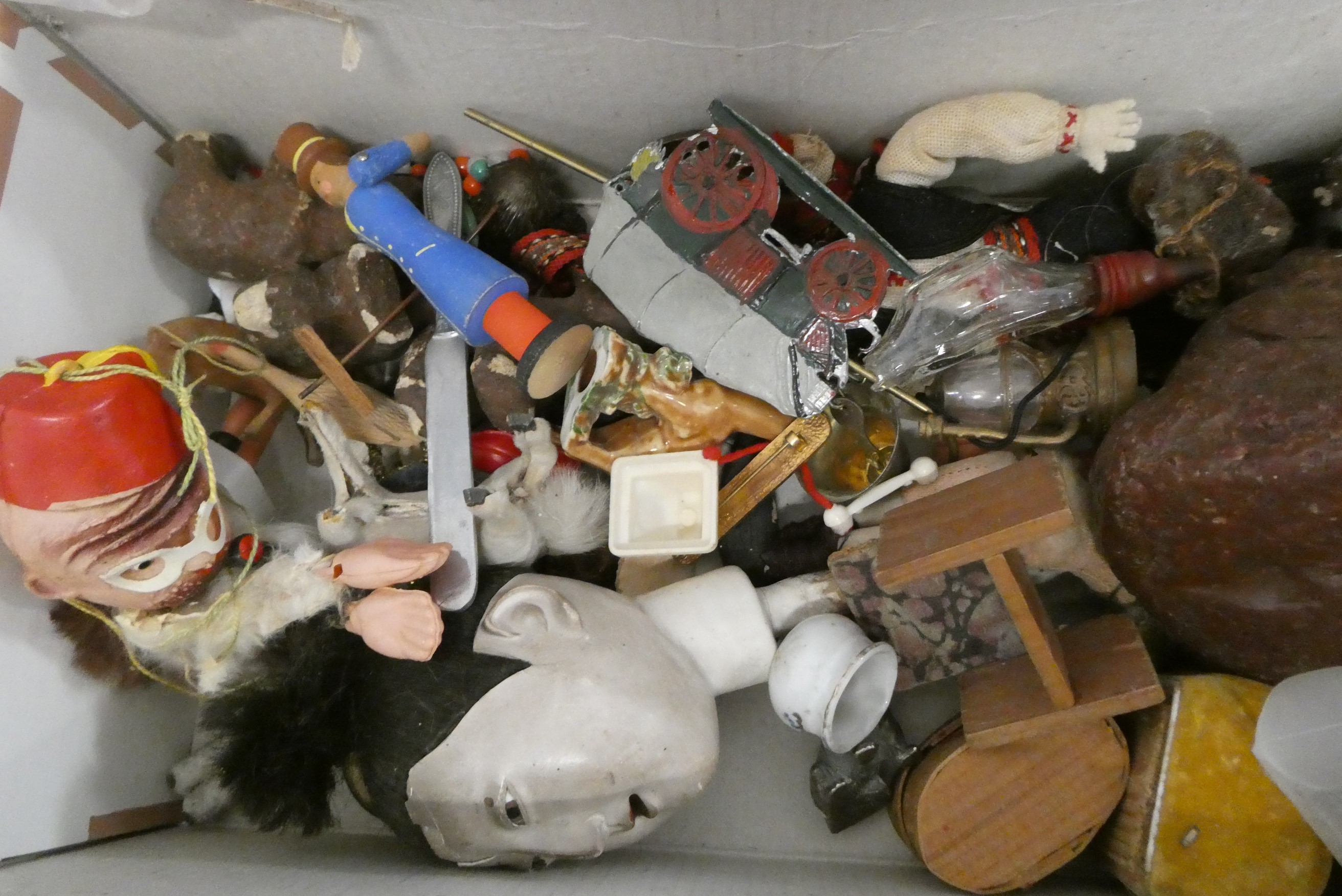A boxed filled with vintage and antique toys, including Bonzo salt and pepper, Dismal Desmond pot, a Image