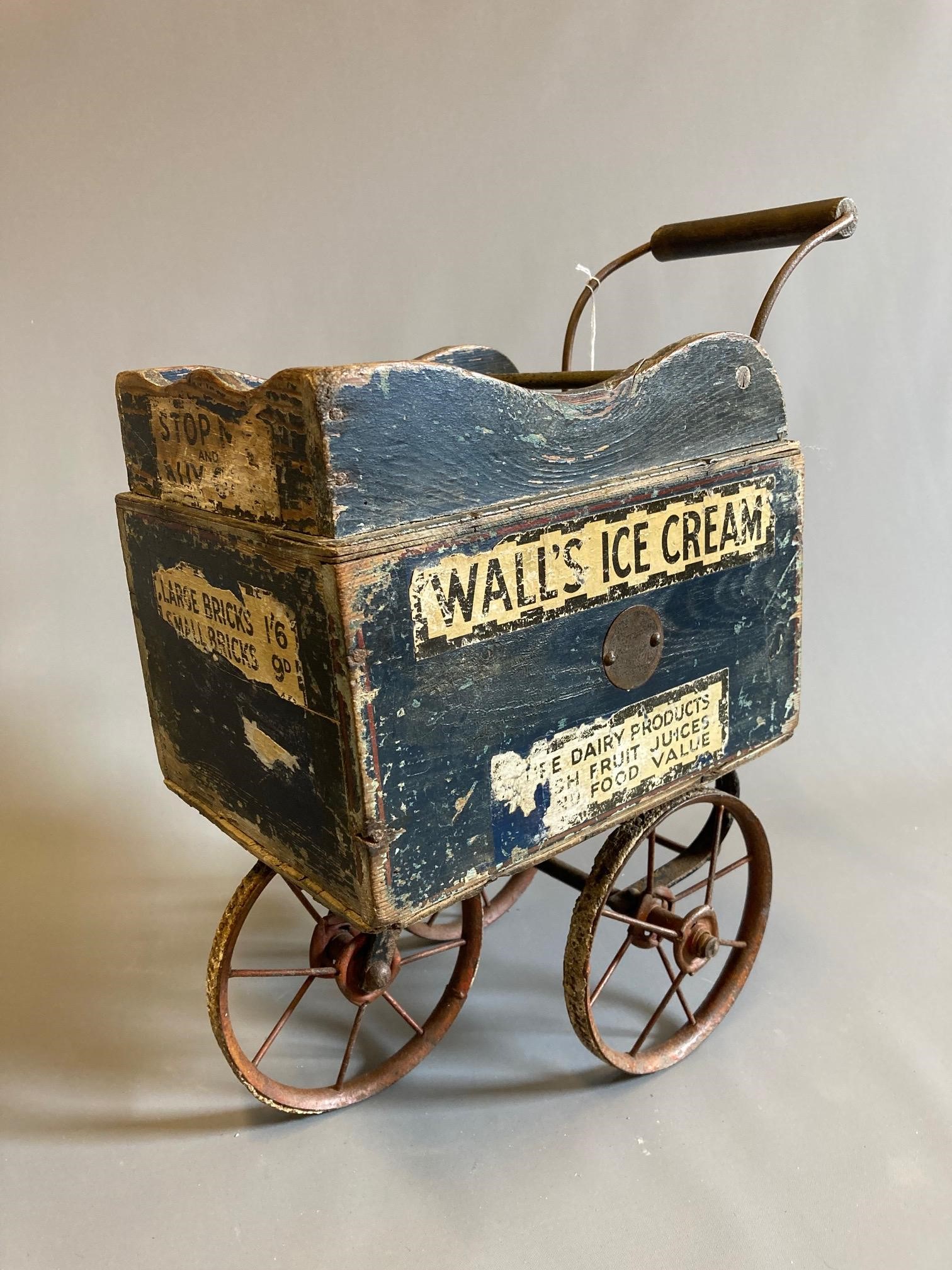 A Pedigree wooden Wall's Ice cream cart block box, painted with metal fittings and wheels, 13" x Image