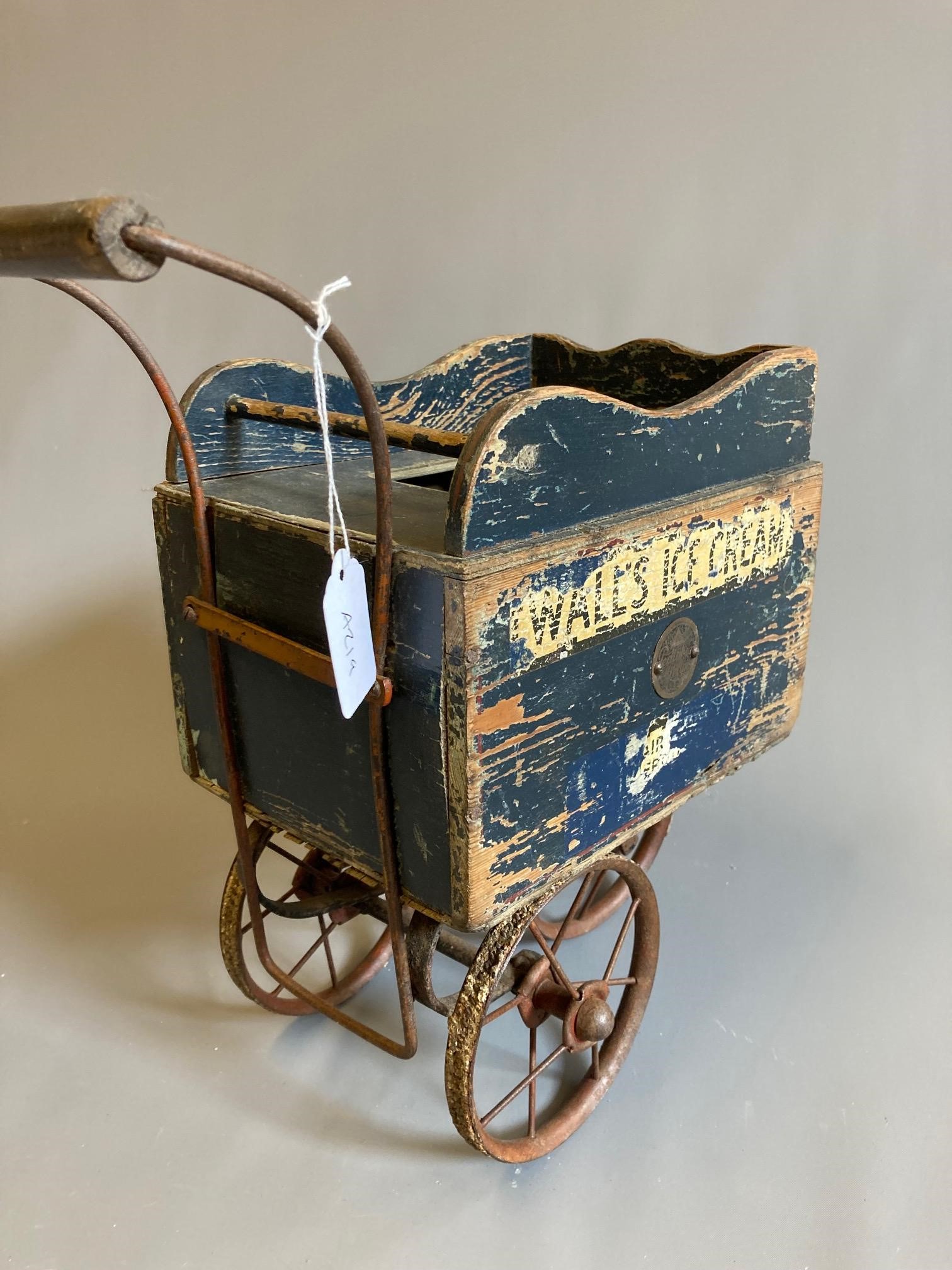 A Pedigree wooden Wall's Ice cream cart block box, painted with metal fittings and wheels, 13" x Image