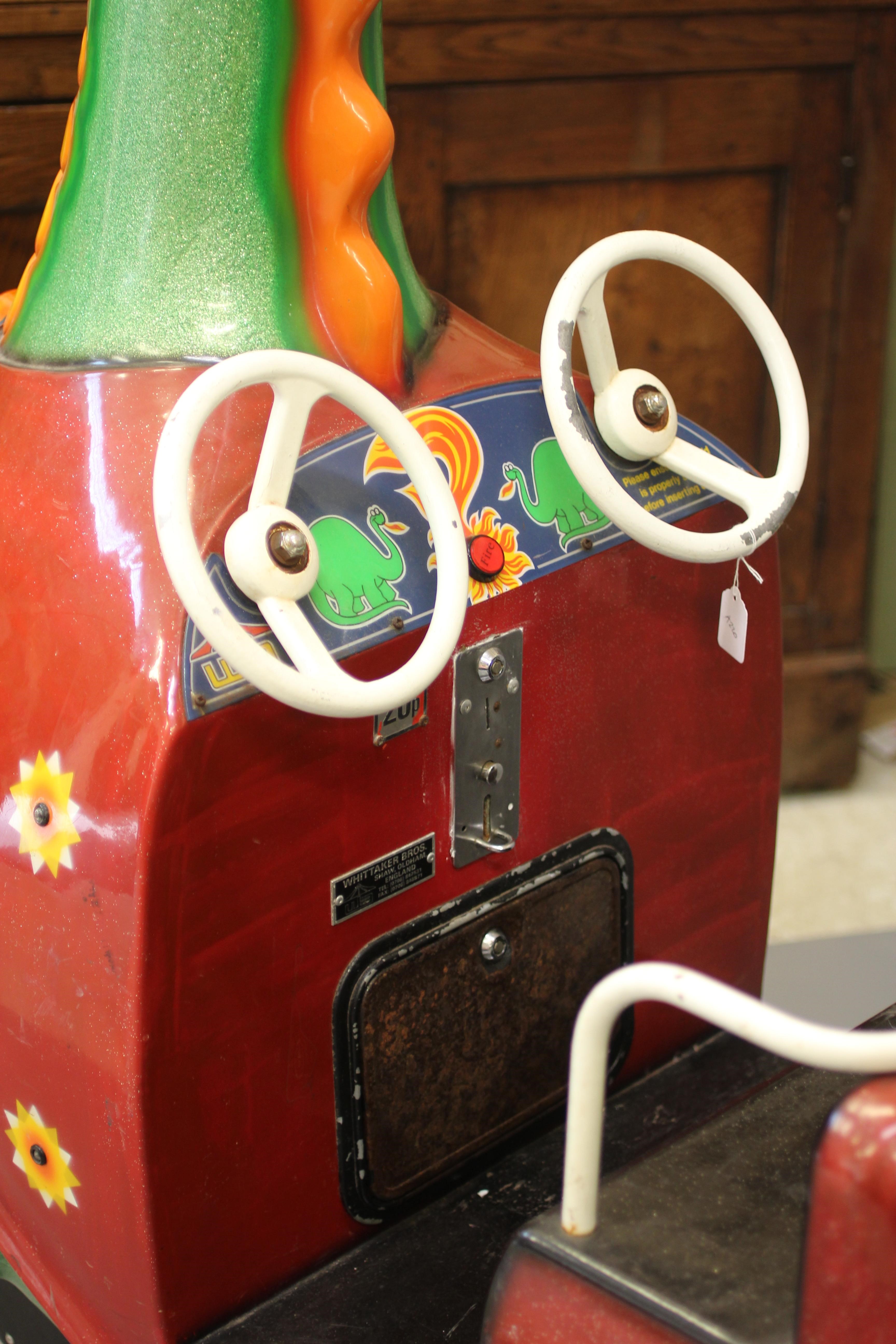 A Puff the Magic Dragon coin operated Whittaker Bros. kids ride, with 20p price, twin steering Image
