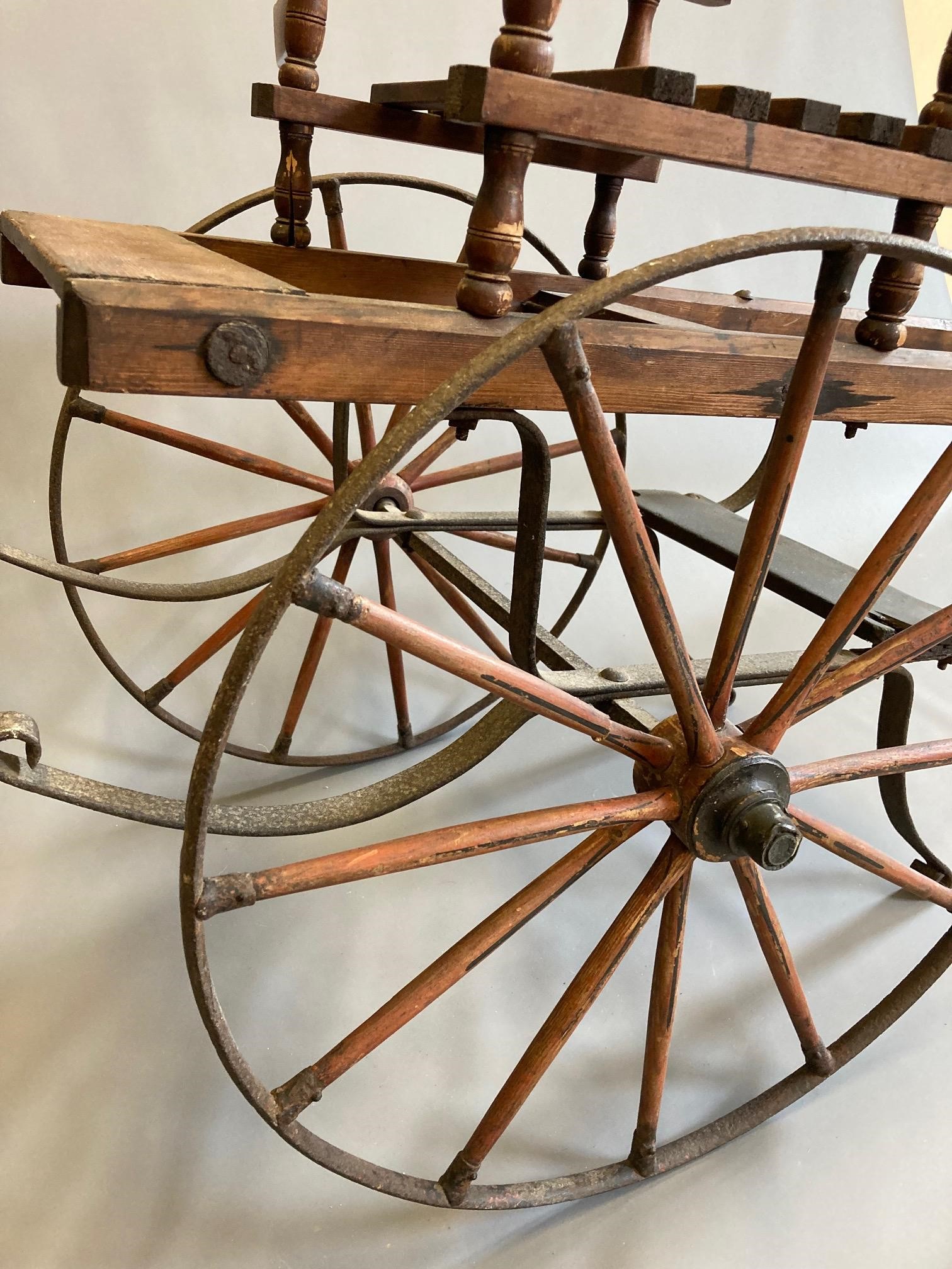 A Victorian "Royal Mail" dog cart, labelled 'Simpson, Fawcett & Co Leeds', of wood and metal Image