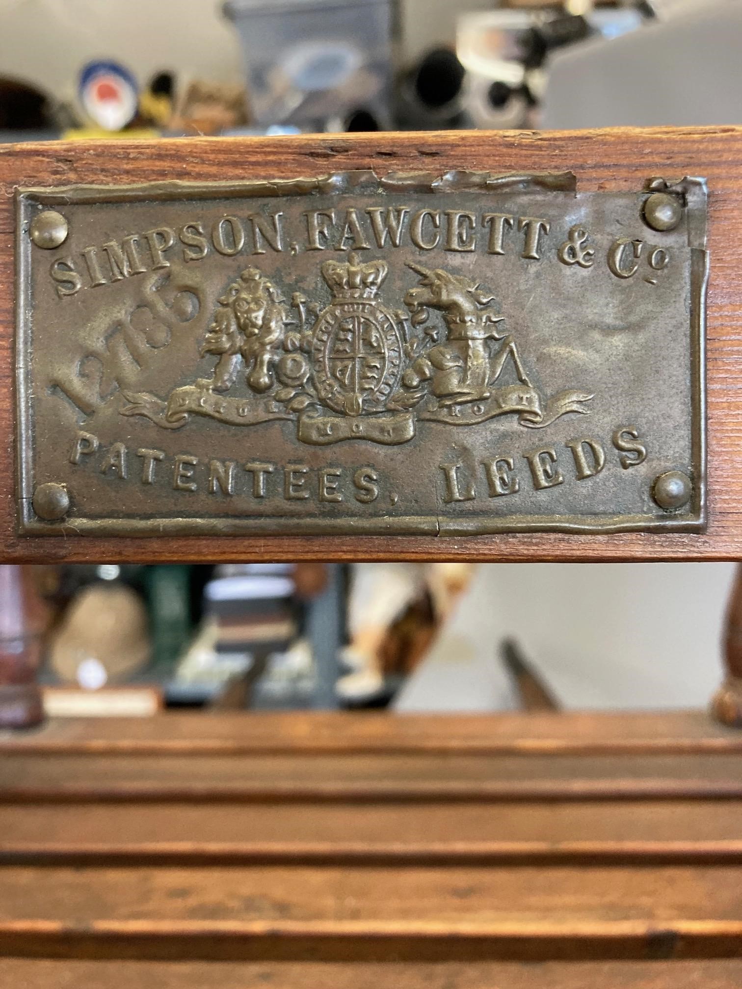 A Victorian "Royal Mail" dog cart, labelled 'Simpson, Fawcett & Co Leeds', of wood and metal Image