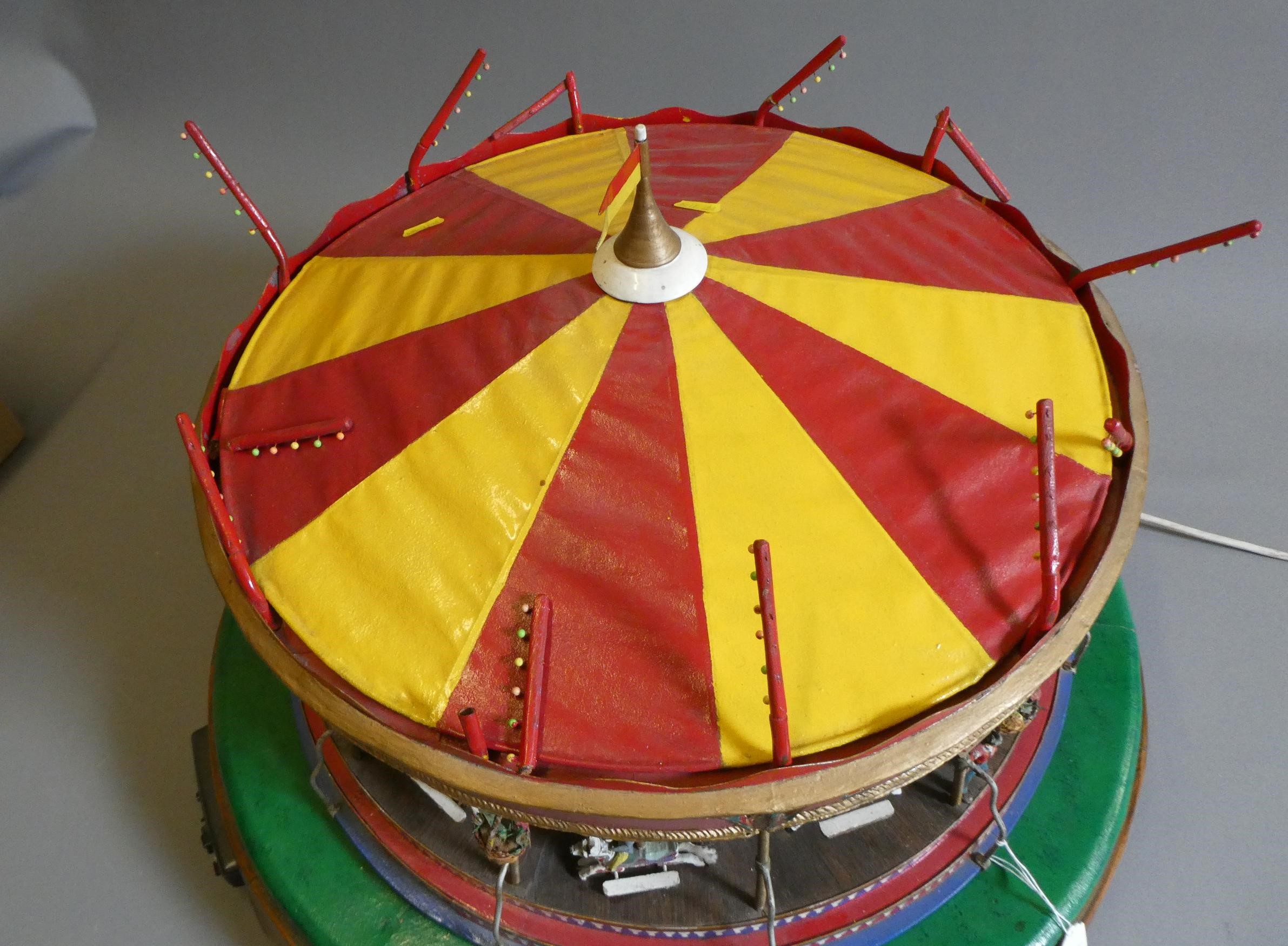 A handmade model gallopers merry-go-round roundabout of wood and brass construction with electric Image