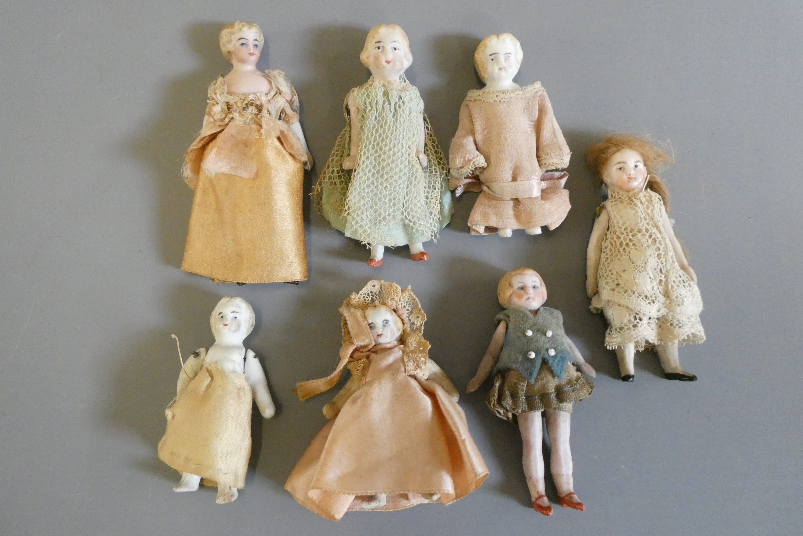 Seven doll's house dolls Image