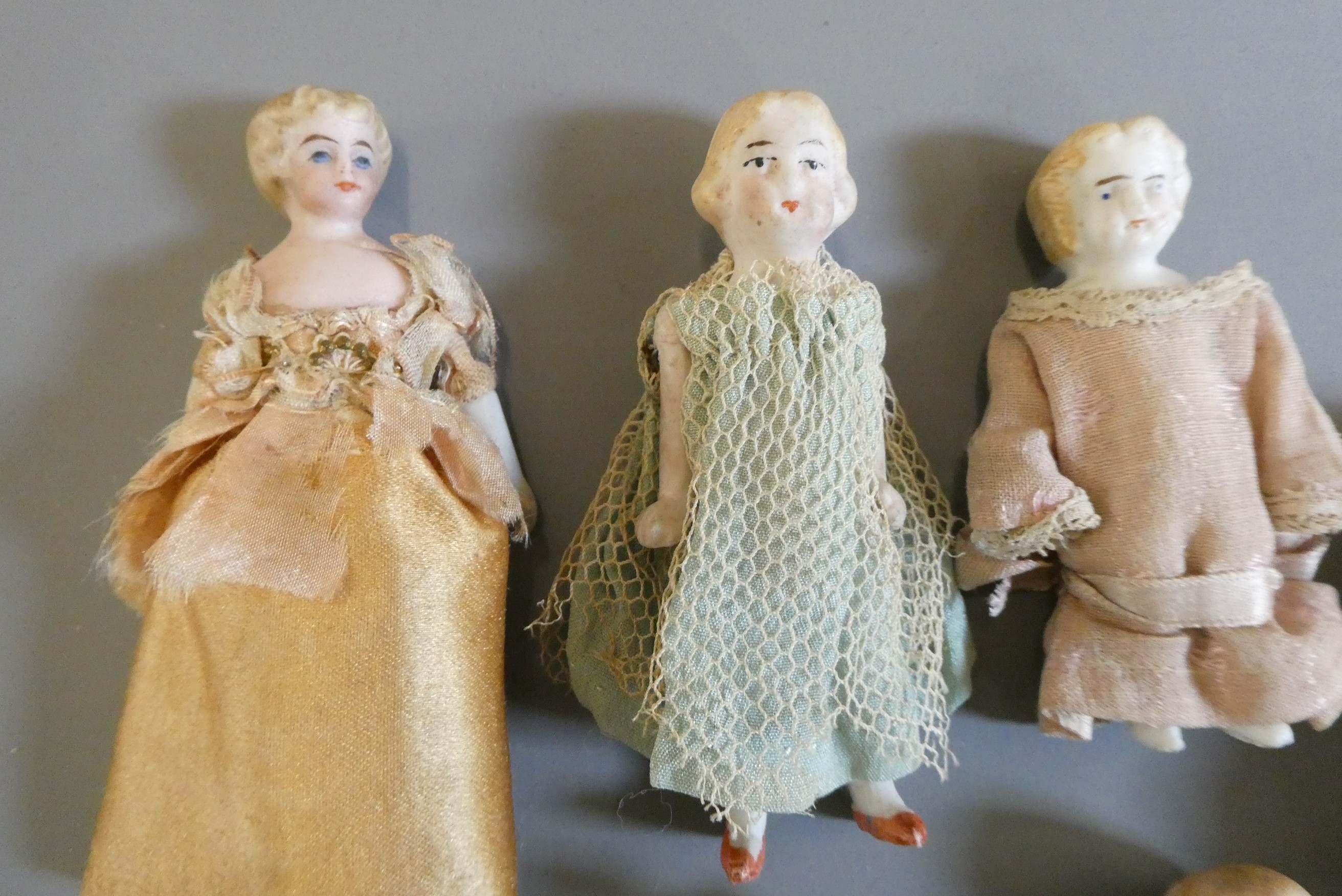 Seven doll's house dolls Image