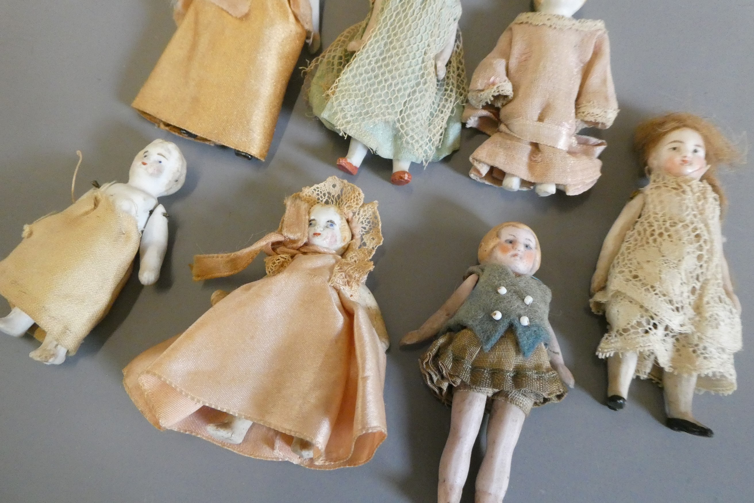 Seven doll's house dolls Image