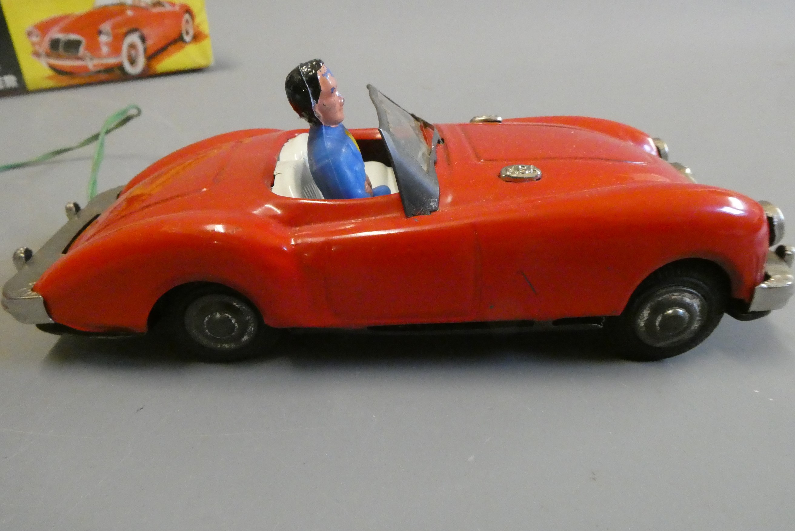 Lincoln battery operated MGA sports car finished in red, tested in working order, box good, model Image