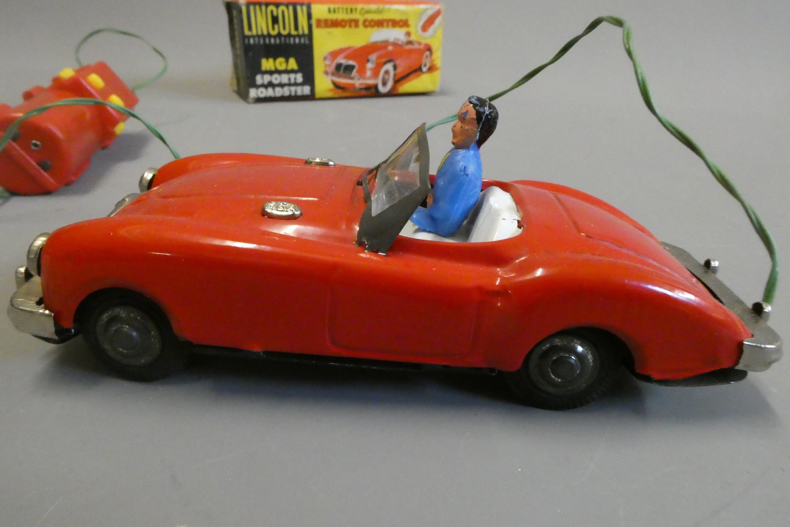 Lincoln battery operated MGA sports car finished in red, tested in working order, box good, model Image