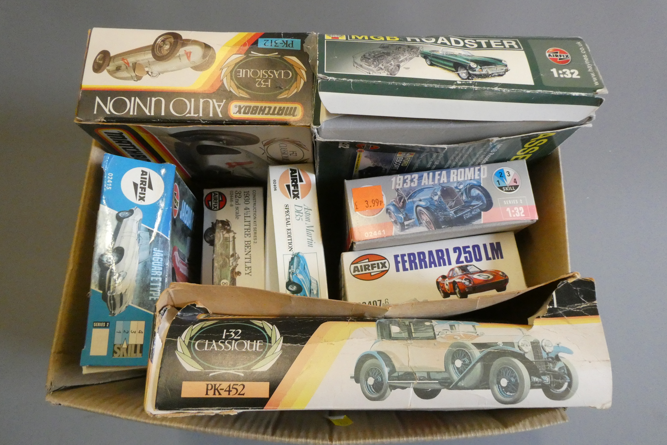 Plastic construction kits by Airfix and Matchbox, all 1:24 or 1:32 scale cars, some boxes fair, Image