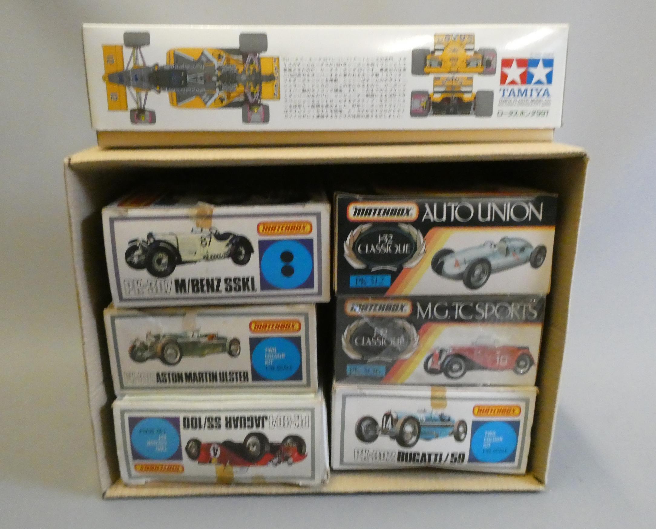 Plastic construction kits by Airfix, Matchbox and Tamiya, all 1:24 or 1:32 scale cars, some items Image
