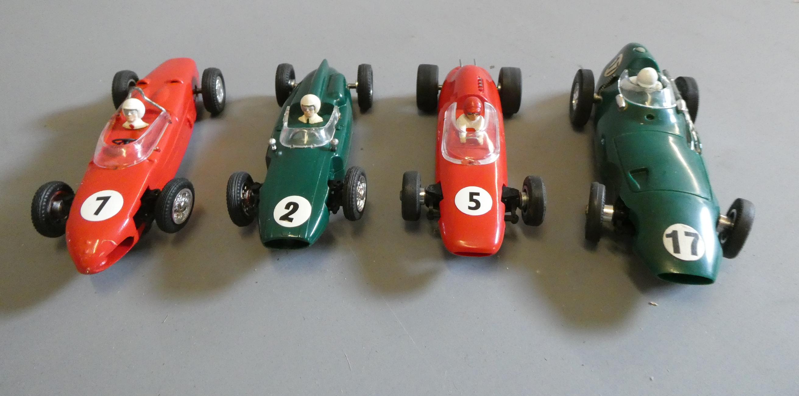 Three Airfix MRRC slot cars comprising Vanwall, Ferrari Copper and No.5 single seat race car, good Image
