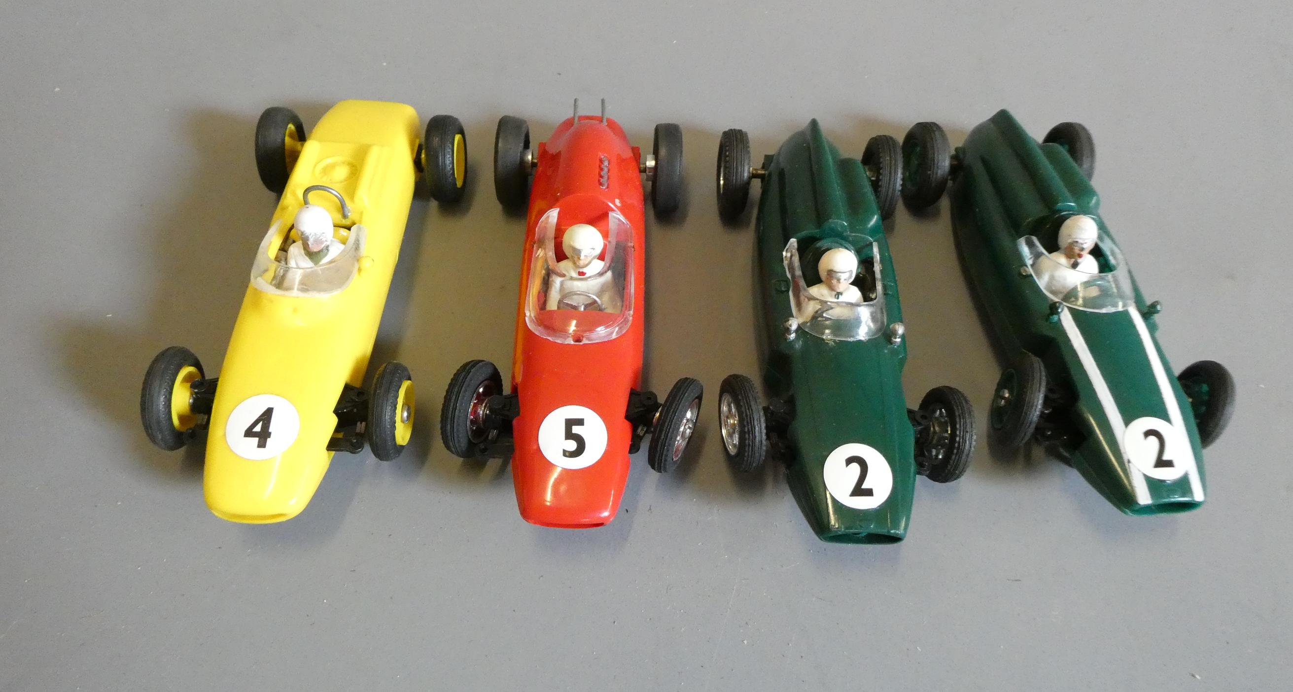 Four Airfix MRRC slot cars comprising two Copper and two single seat race cars, good (Est. plus 24% Image