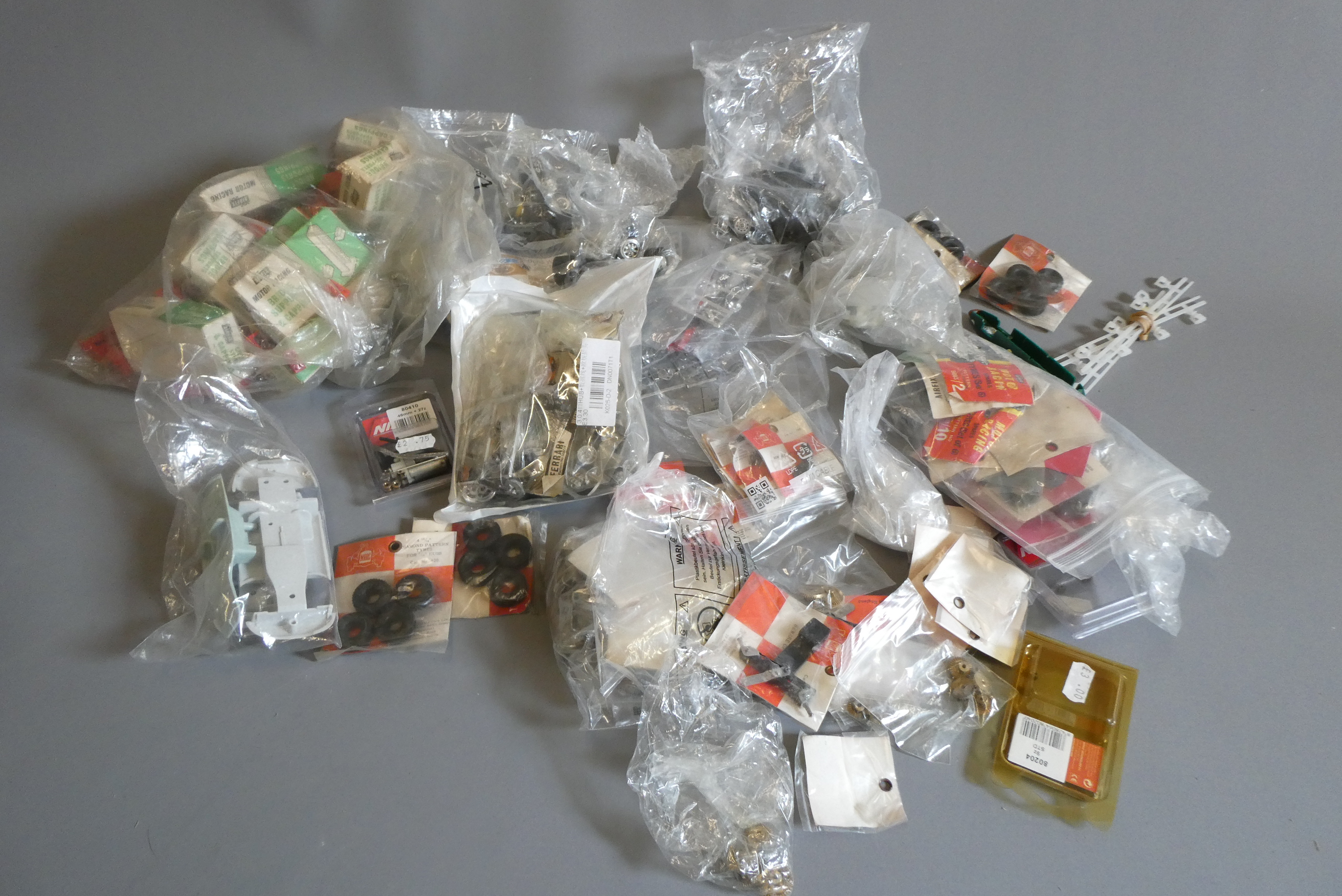 Spare parts for Airfix slot cars including gears and motors, body parts and accessories, good to Image