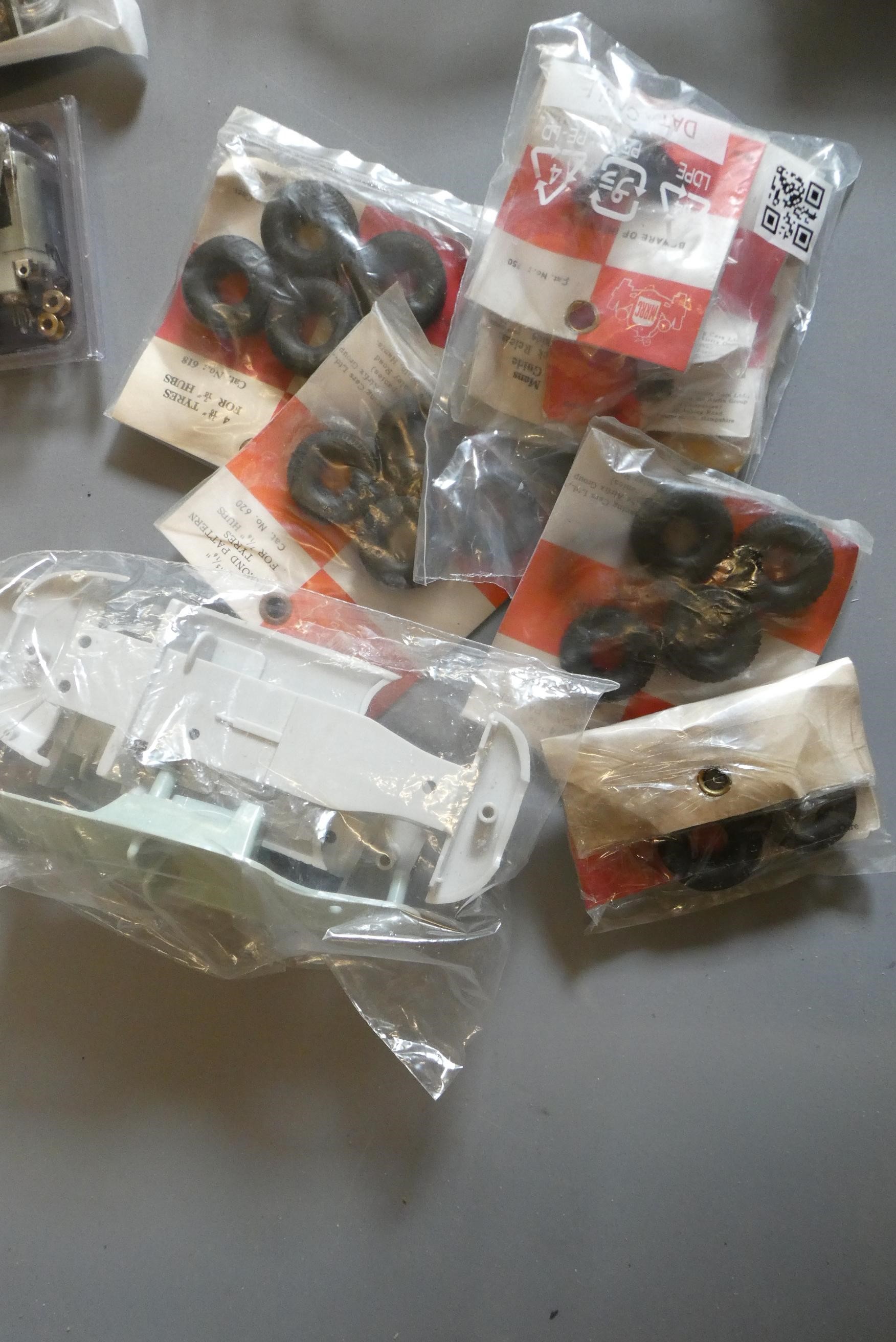 Spare parts for Airfix slot cars including gears and motors, body parts and accessories, good to Image