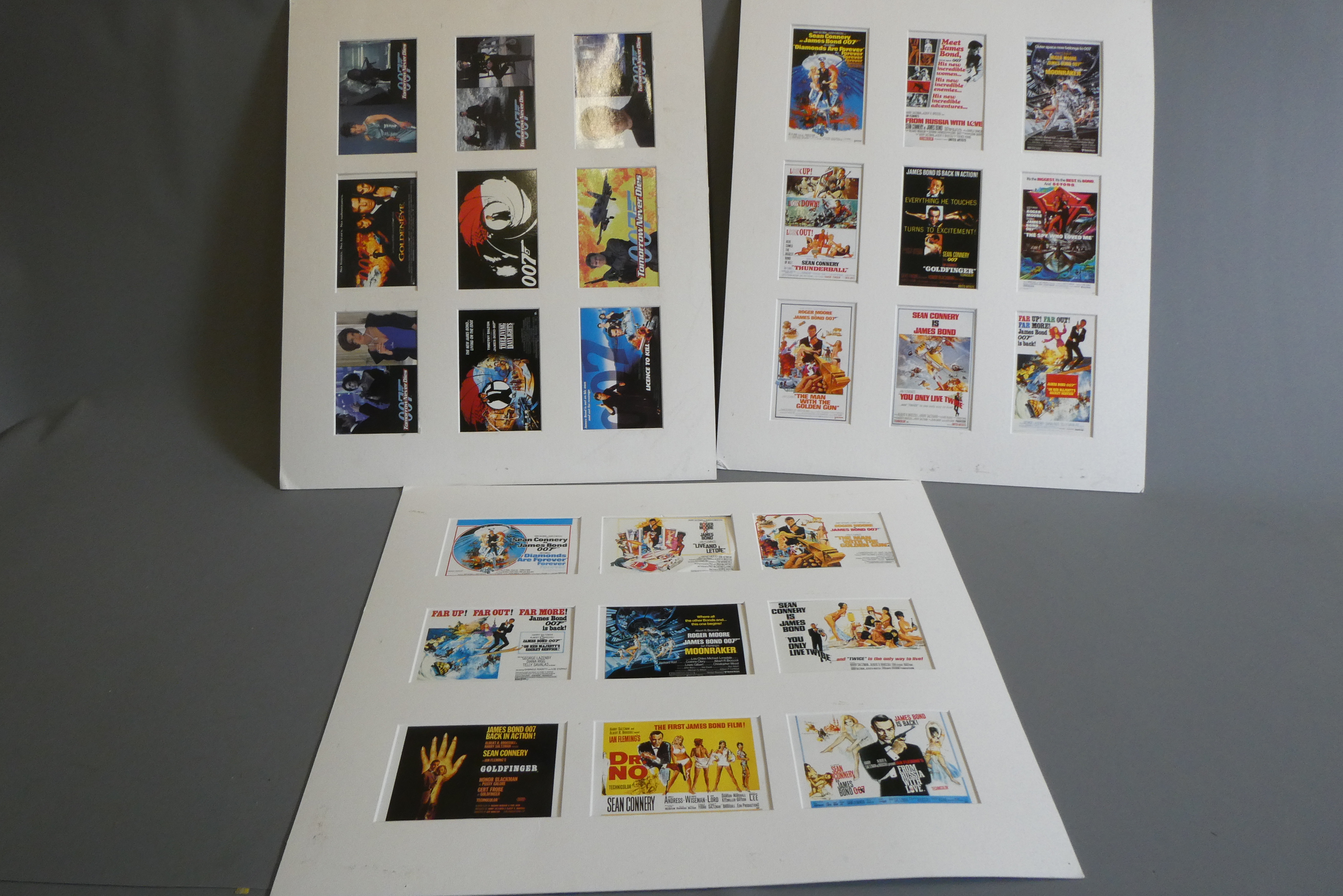 Twenty seven James Bond themed postcards on three mount boards, good to excellent (Est. plus 24% Image
