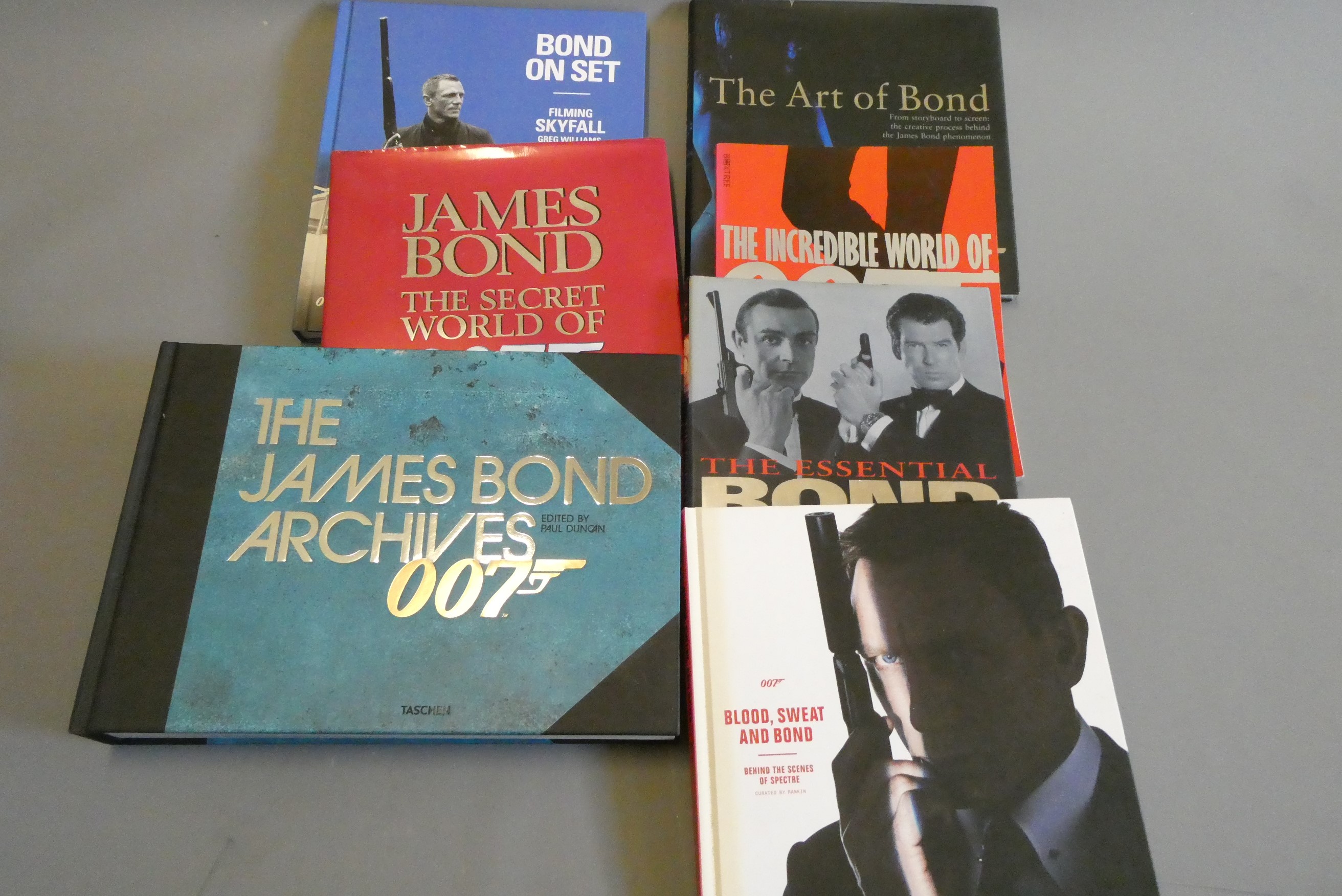 A collection of books and magazines on the James Bond Films Image