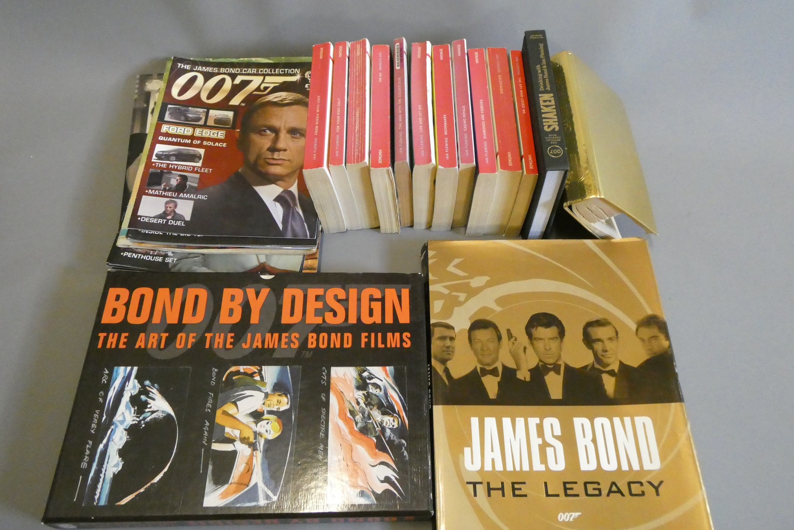 A collection of books and magazines on the James Bond Films Image